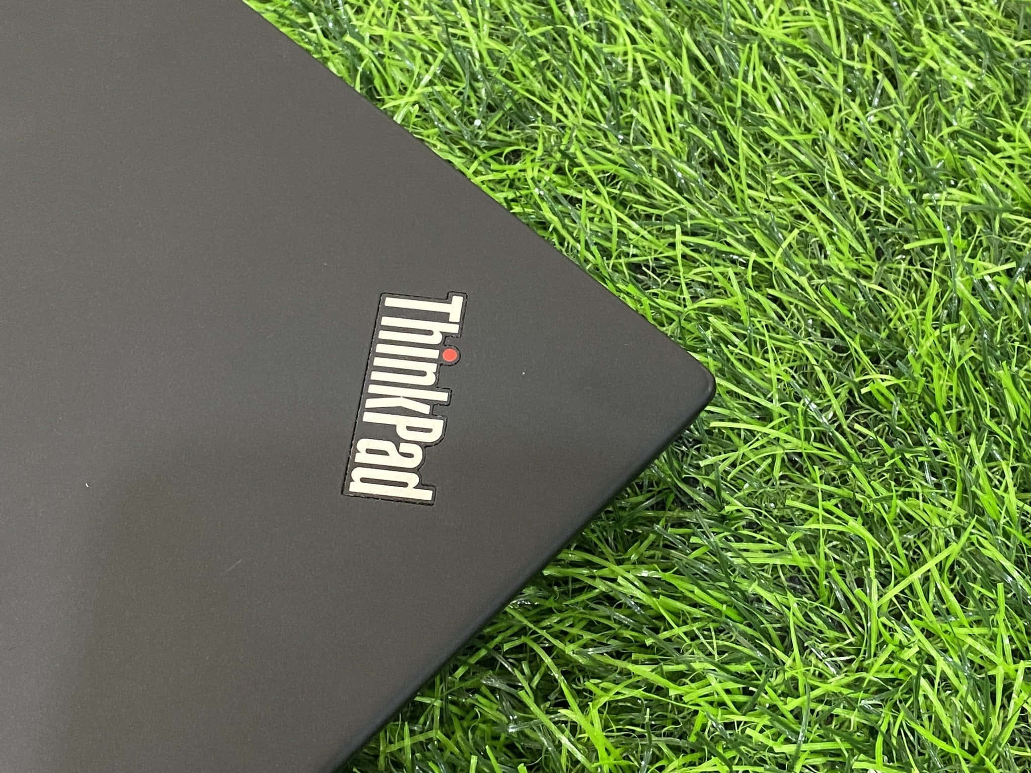 ThinkPad, black, vibrant green artificial grass, Full HD Desktop Wallpaper