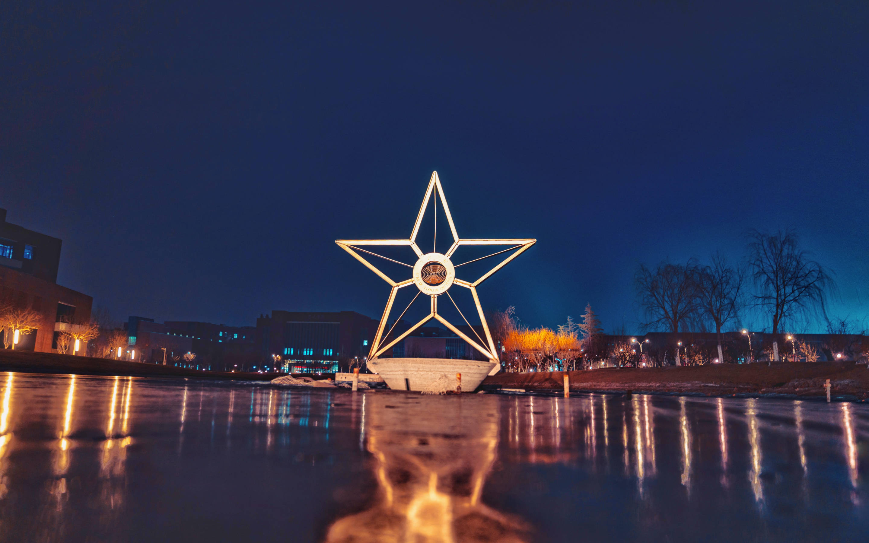 Tianjin Star Figure, glowing star sculpture, icy water, 2K Desktop Wallpaper