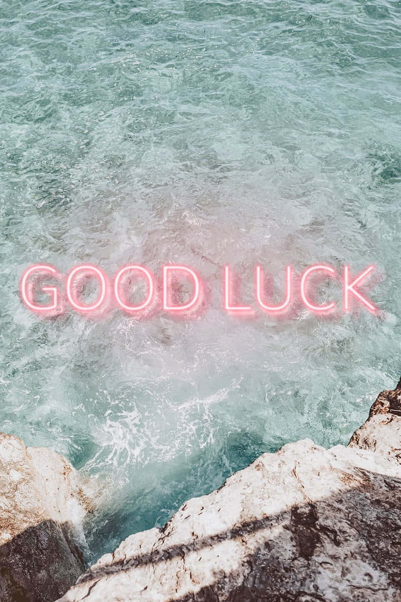 good luck neon sign, turquoise ocean, white rocks, SD Phone Wallpaper