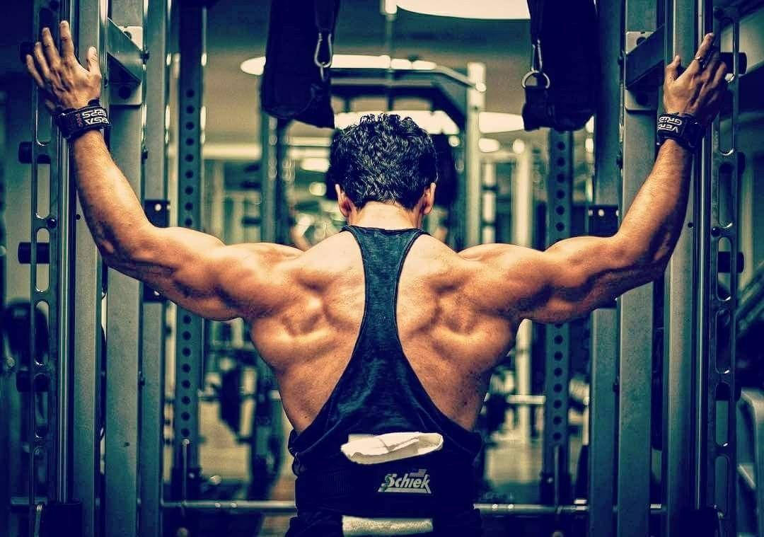 Tiger Shroff, gym machine, dimly lit weight room, SD Desktop Wallpaper