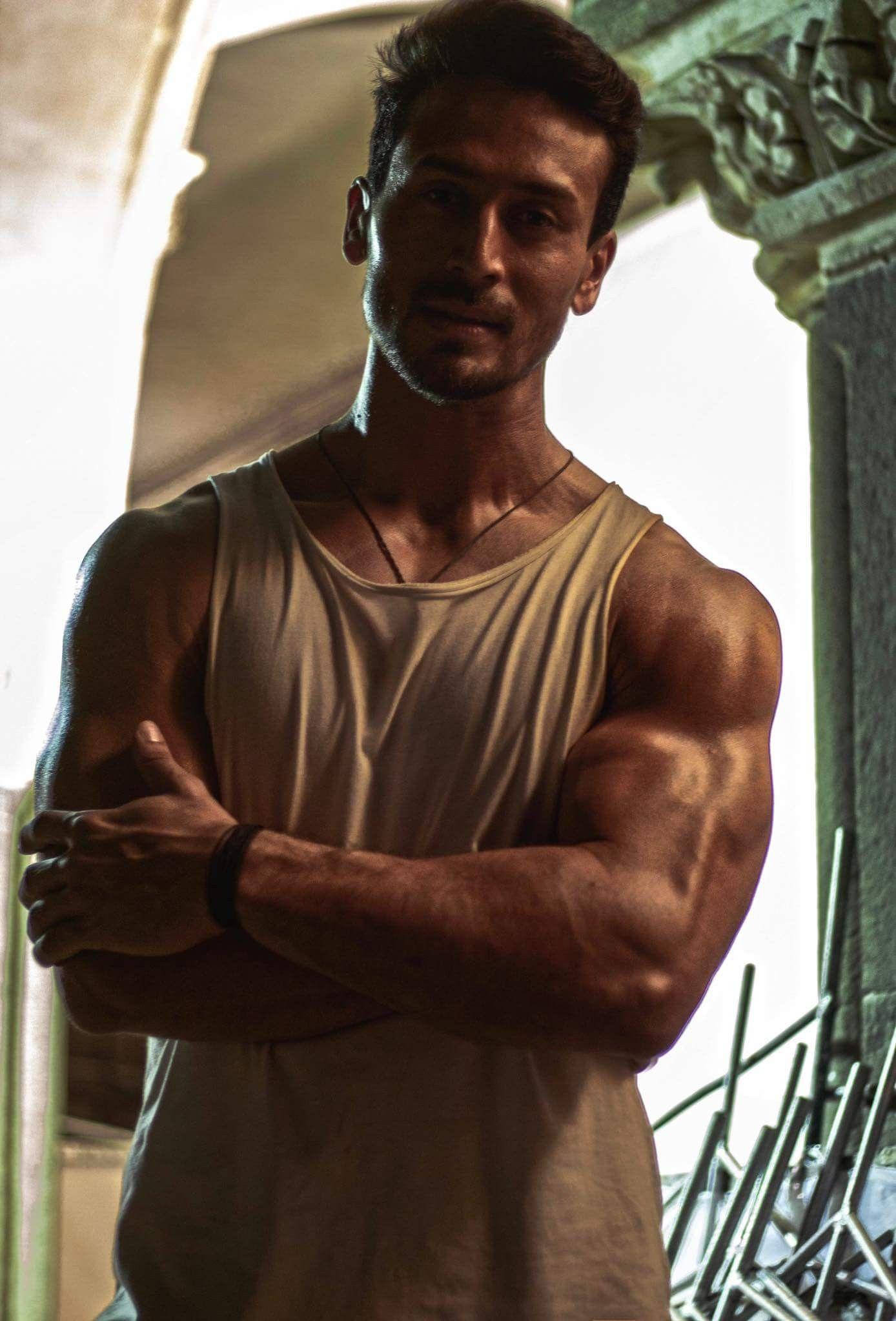 Tiger Shroff, beige tank top, warm architectural arches, Full HD Phone Wallpaper
