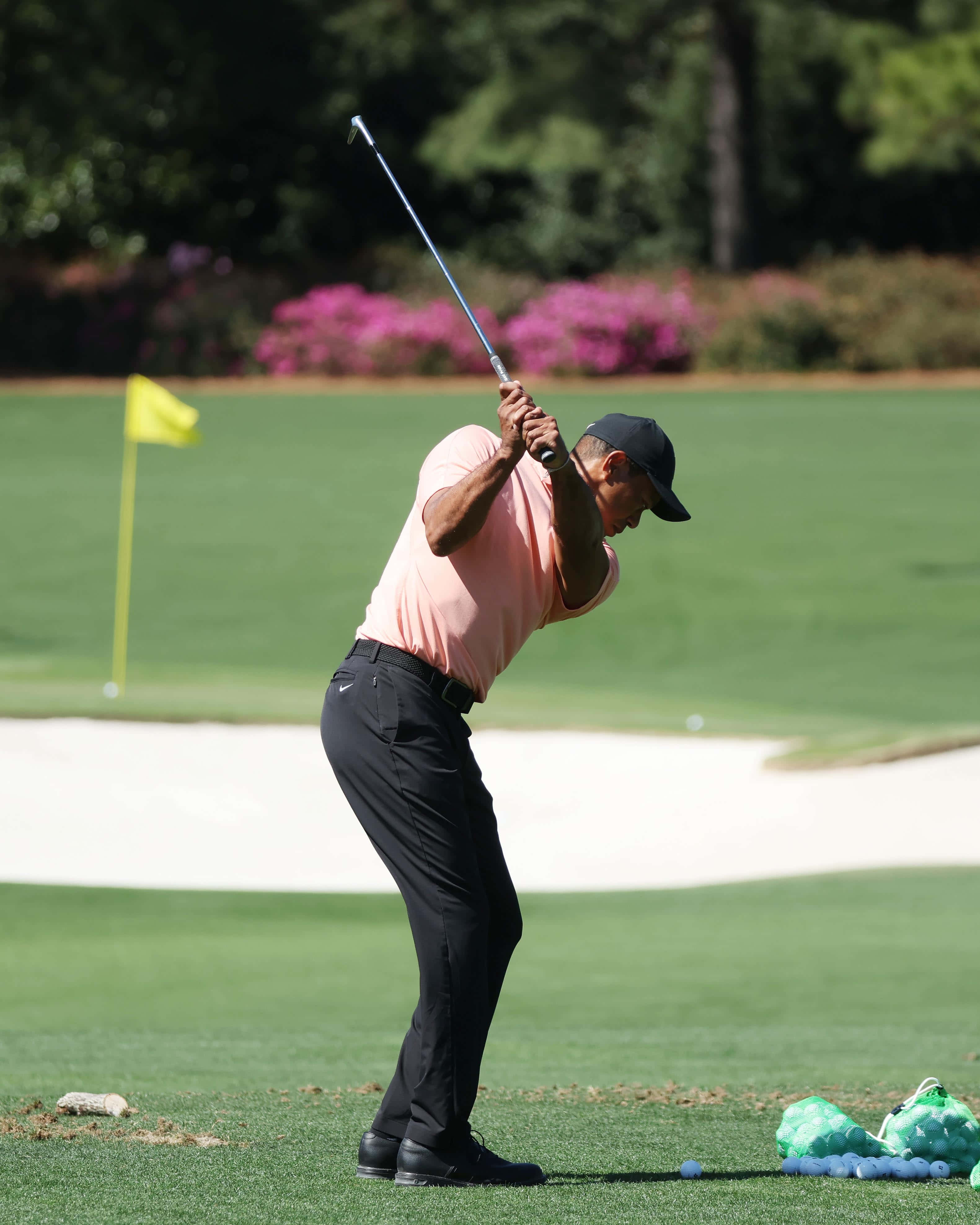 Tiger Woods iPhone, peach shirt, sunlit green course, 4K Phone Wallpaper