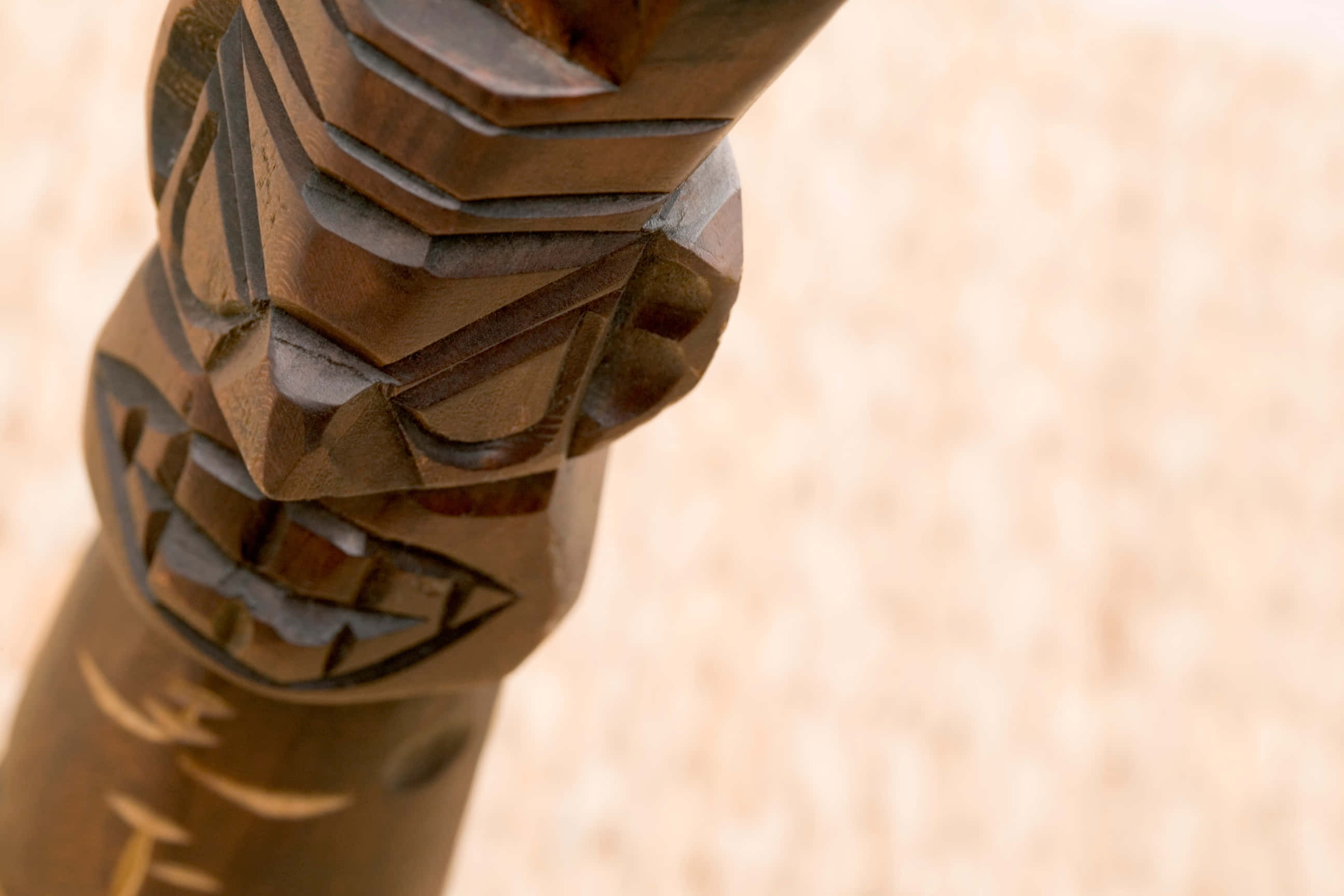 carved wooden tiki statue, weathered wooden totem pole, intricate carved facial features, 2K Desktop Wallpaper