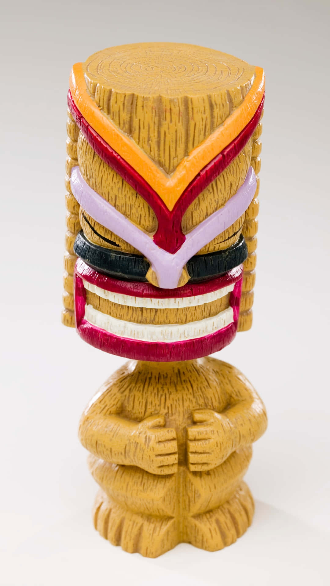 colorful wooden tiki statue, orange red, purple accents, Full HD Phone Wallpaper