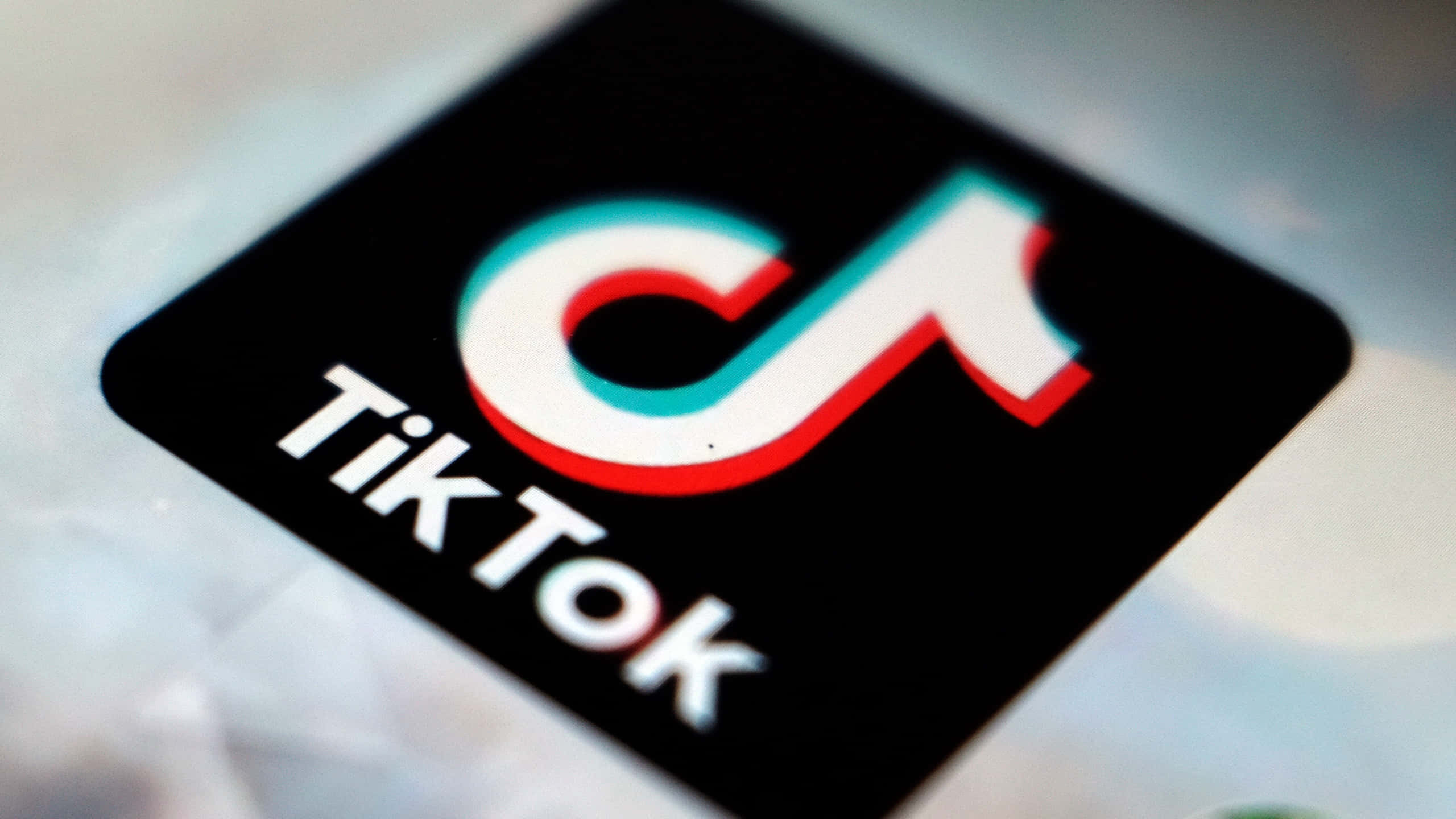 TikTok, logo, smartphone screen, 2K Desktop Wallpaper