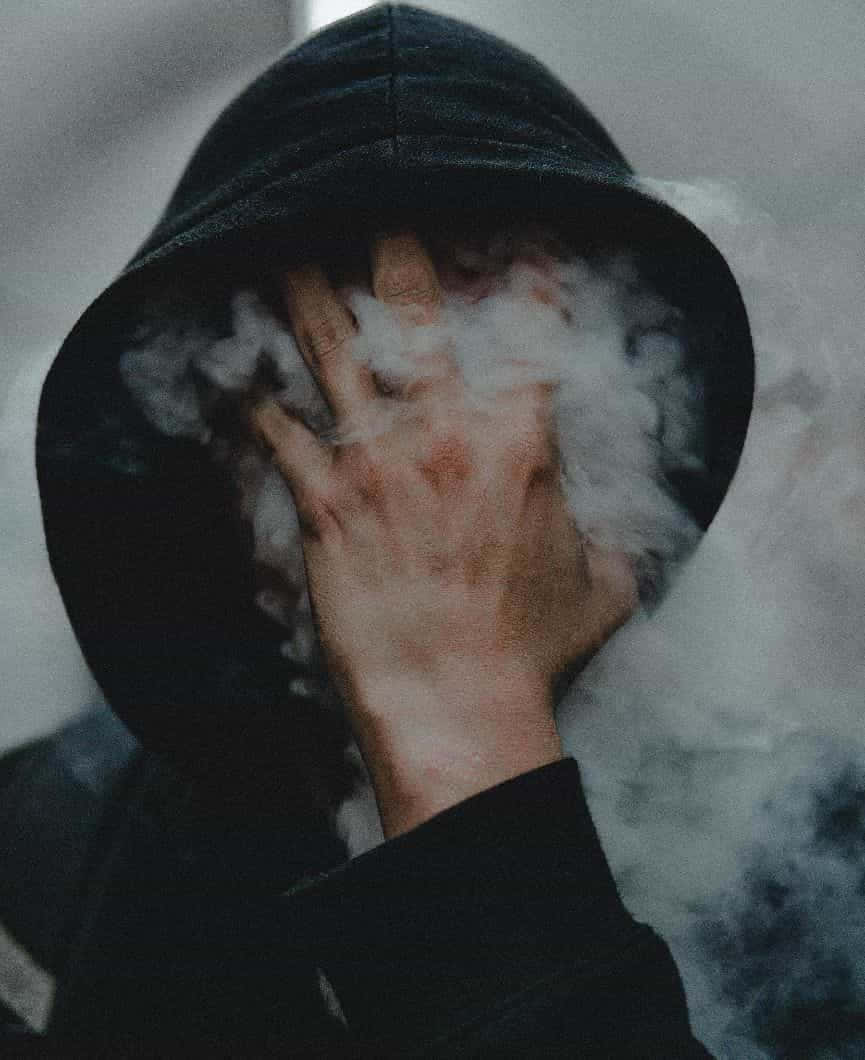 man, dark hoodie, white vapor, SD Phone Wallpaper