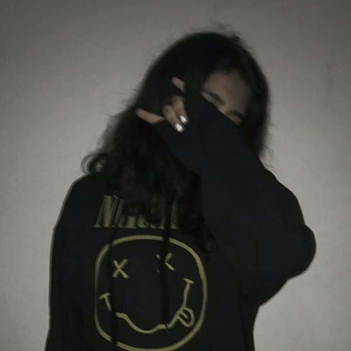 black hoodie, yellow smiley face logo, long dark hair, SD Desktop Wallpaper
