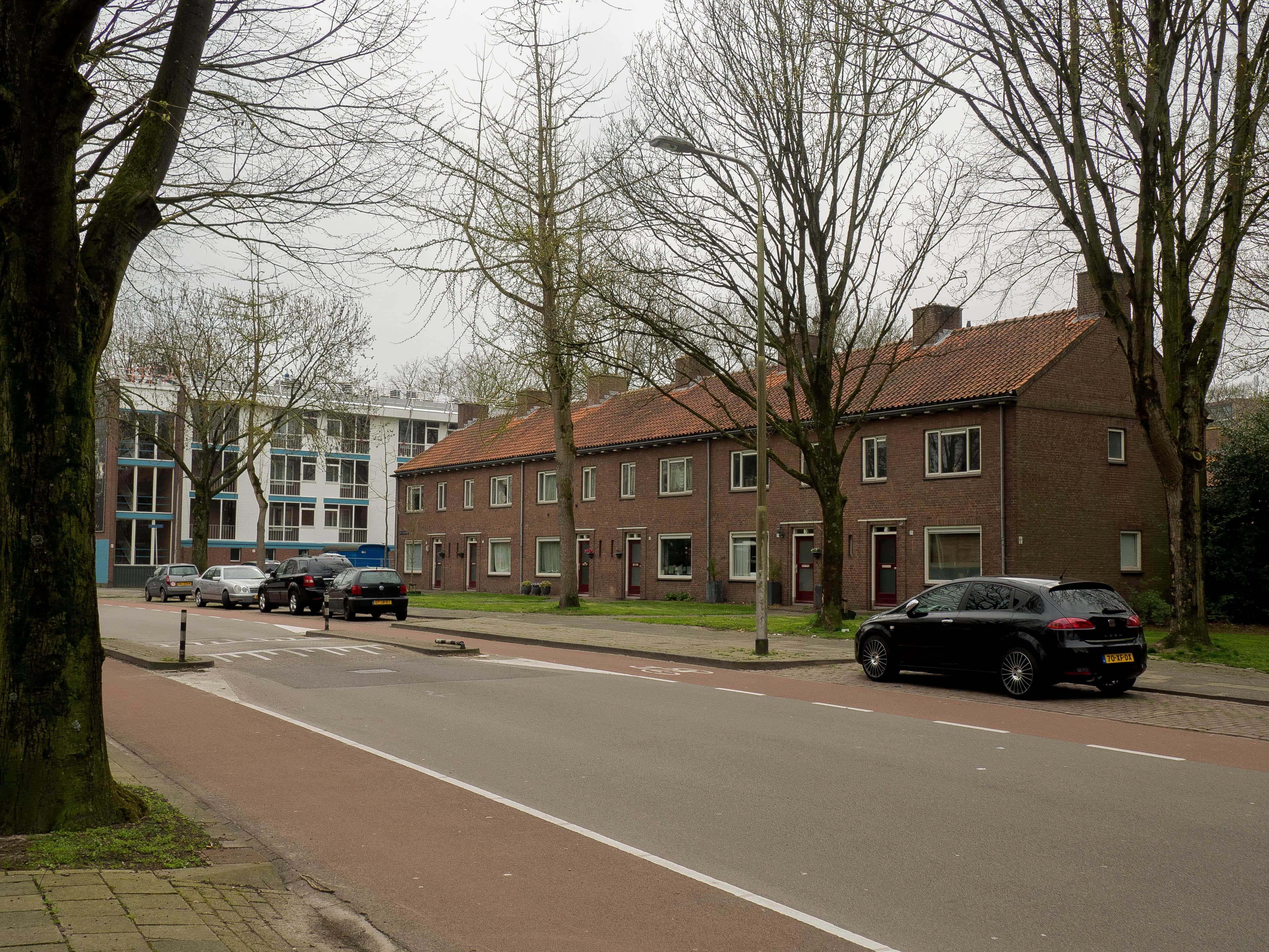 Tilburg, residential street scene, brick row houses, 4K Desktop Wallpaper
