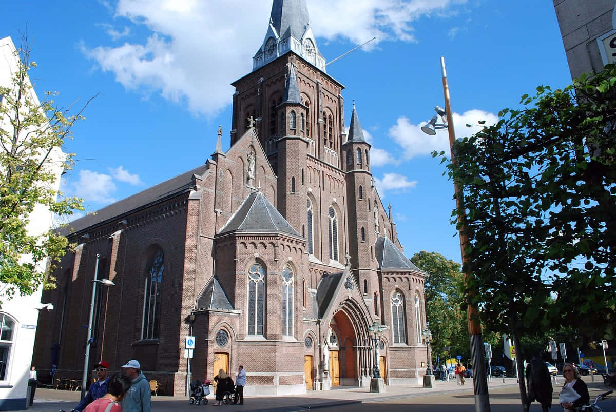 Tilburg, red brick church, tall spires, SD Desktop Wallpaper