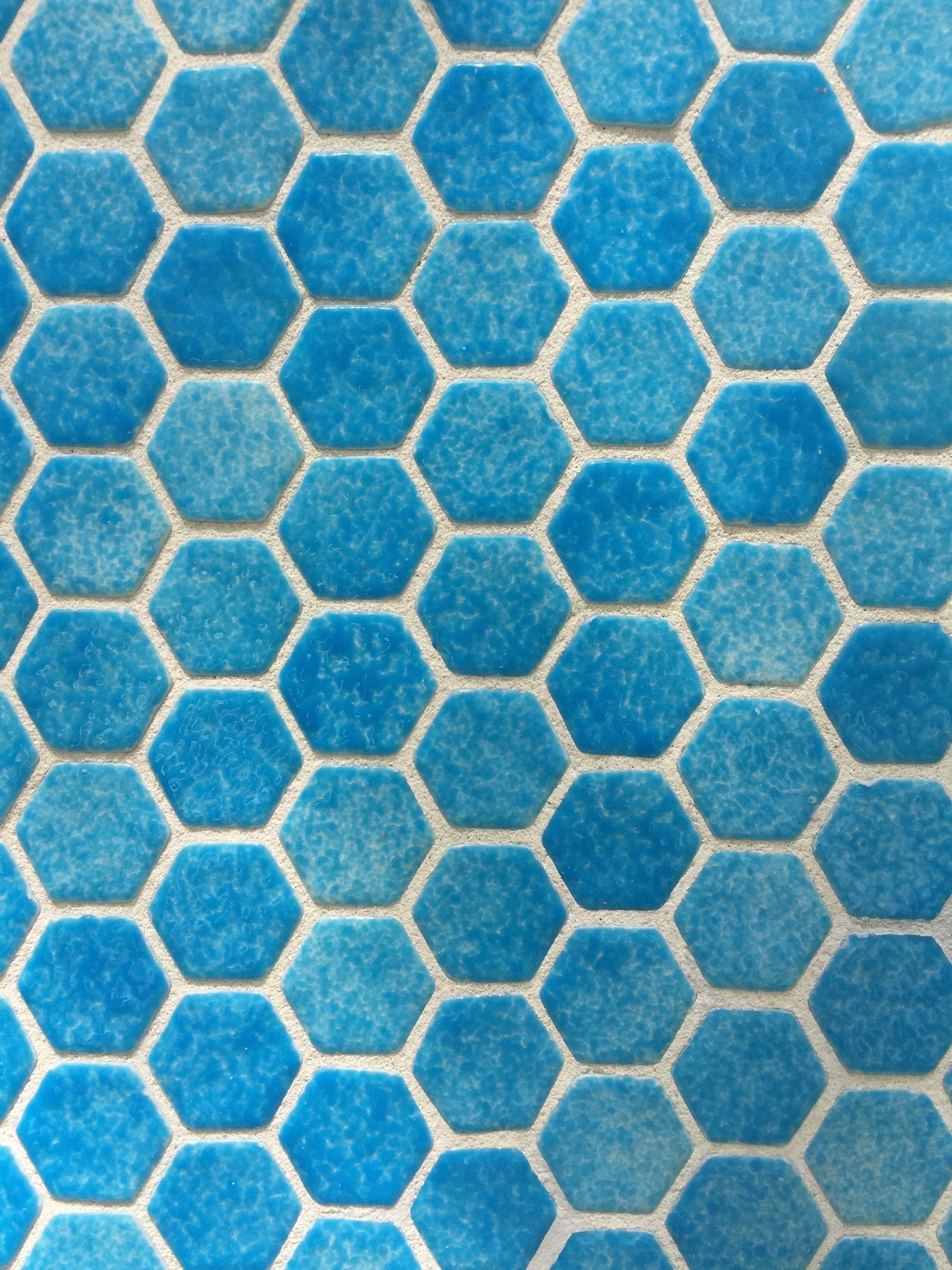 blue hexagonal tile, textured surfaces, light gray grout lines, 2K Phone Wallpaper
