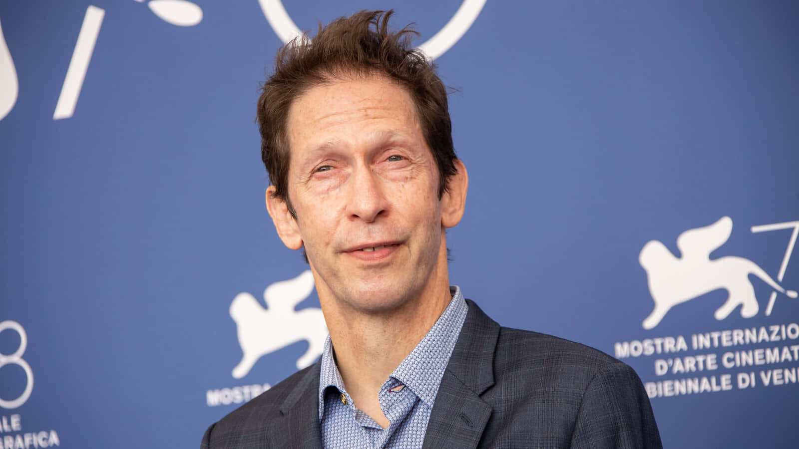 Tim Blake Nelson, blue backdrop, white Venice Film Festival logos, HD Desktop Wallpaper