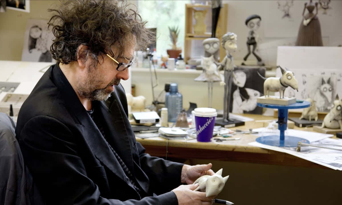 Tim Burton, cluttered studio, whimsical character models, SD Desktop Wallpaper