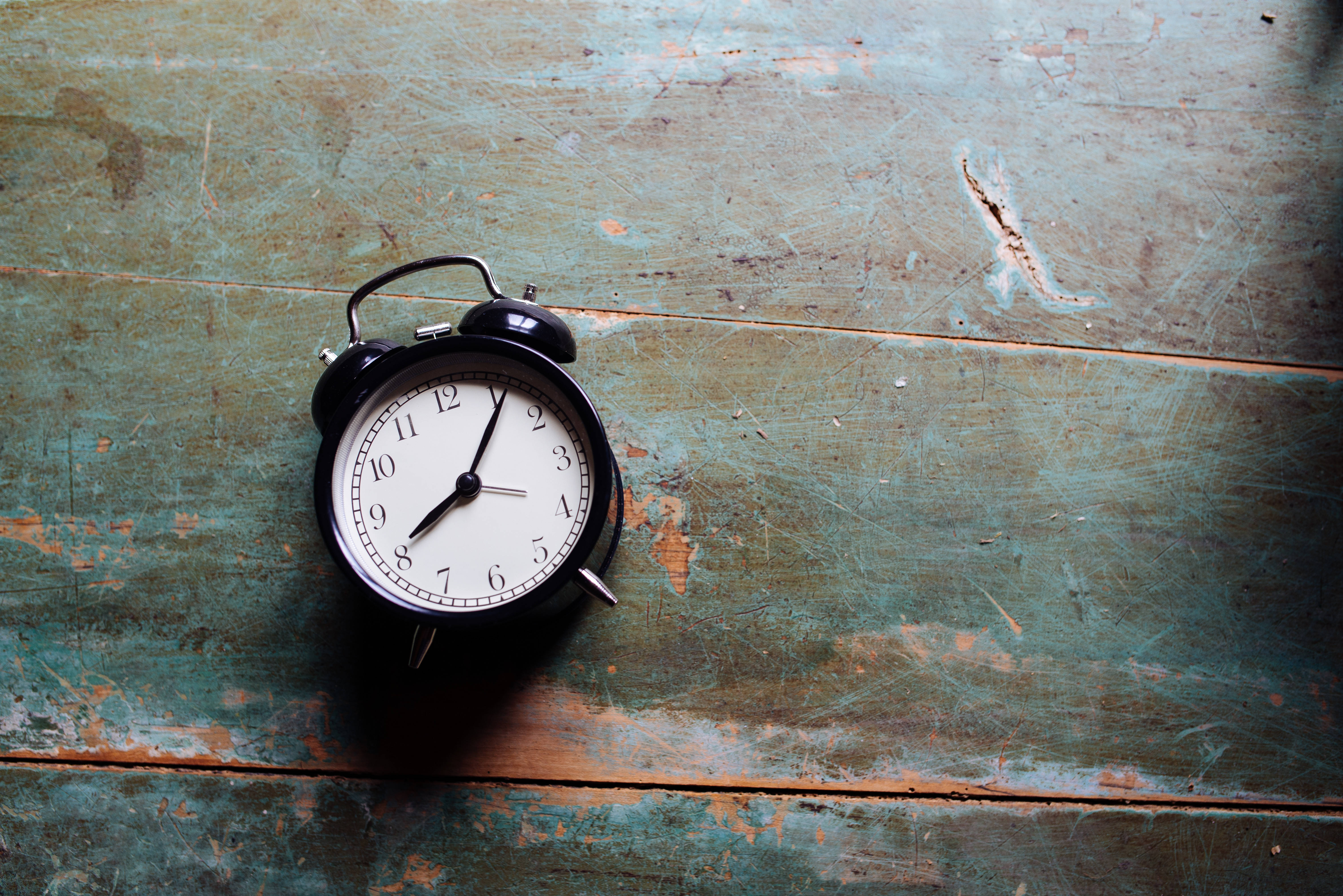 black alarm clock, vintage black alarm clock, weathered teal wooden surface, 5K Desktop Wallpaper