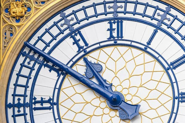 10 to 11 Time-Telling Tower, blue and gold clock face, Roman numerals, SD Desktop Wallpaper