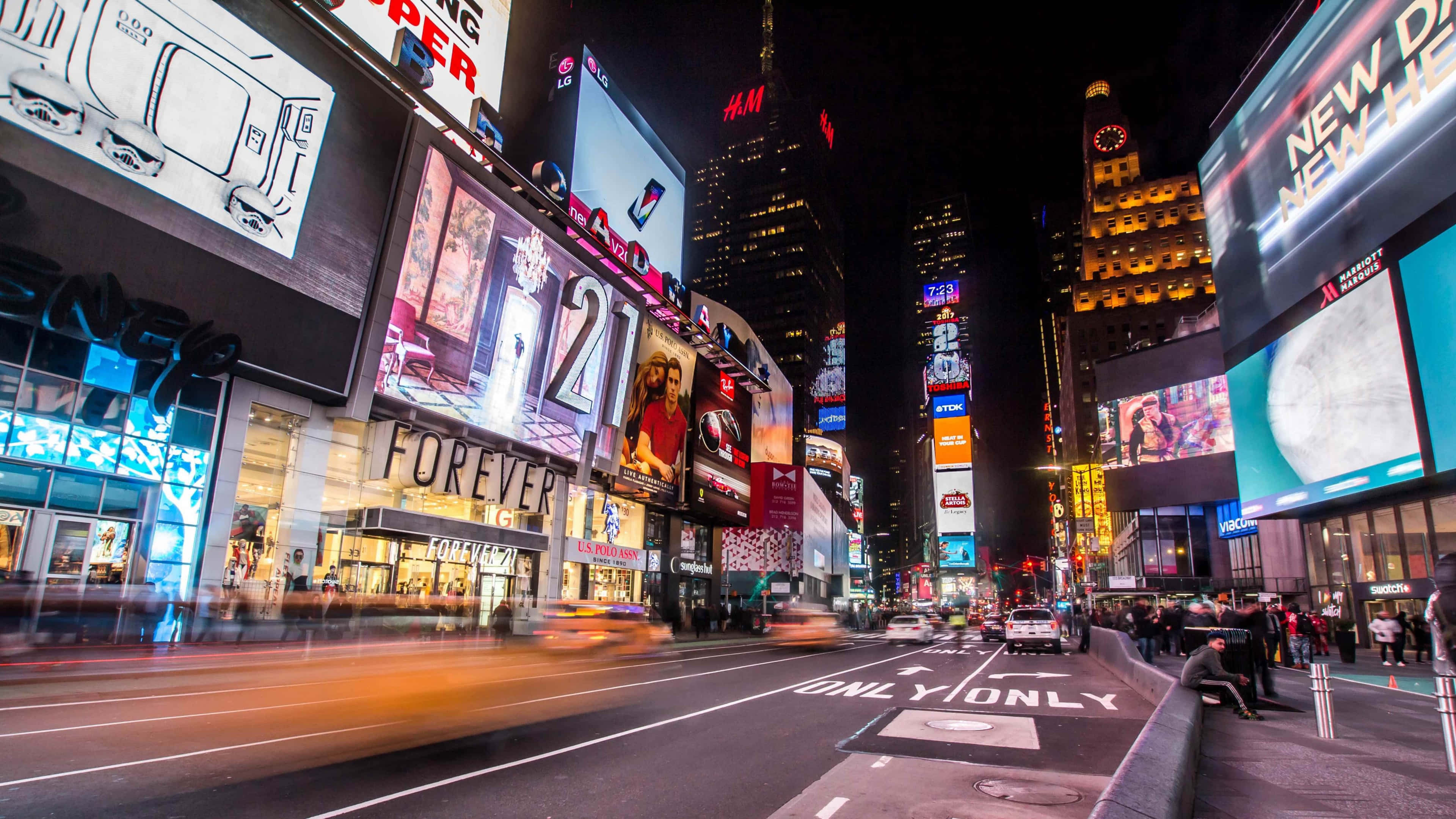 Times Square, neon lights, glowing billboards, 4K Desktop Wallpaper