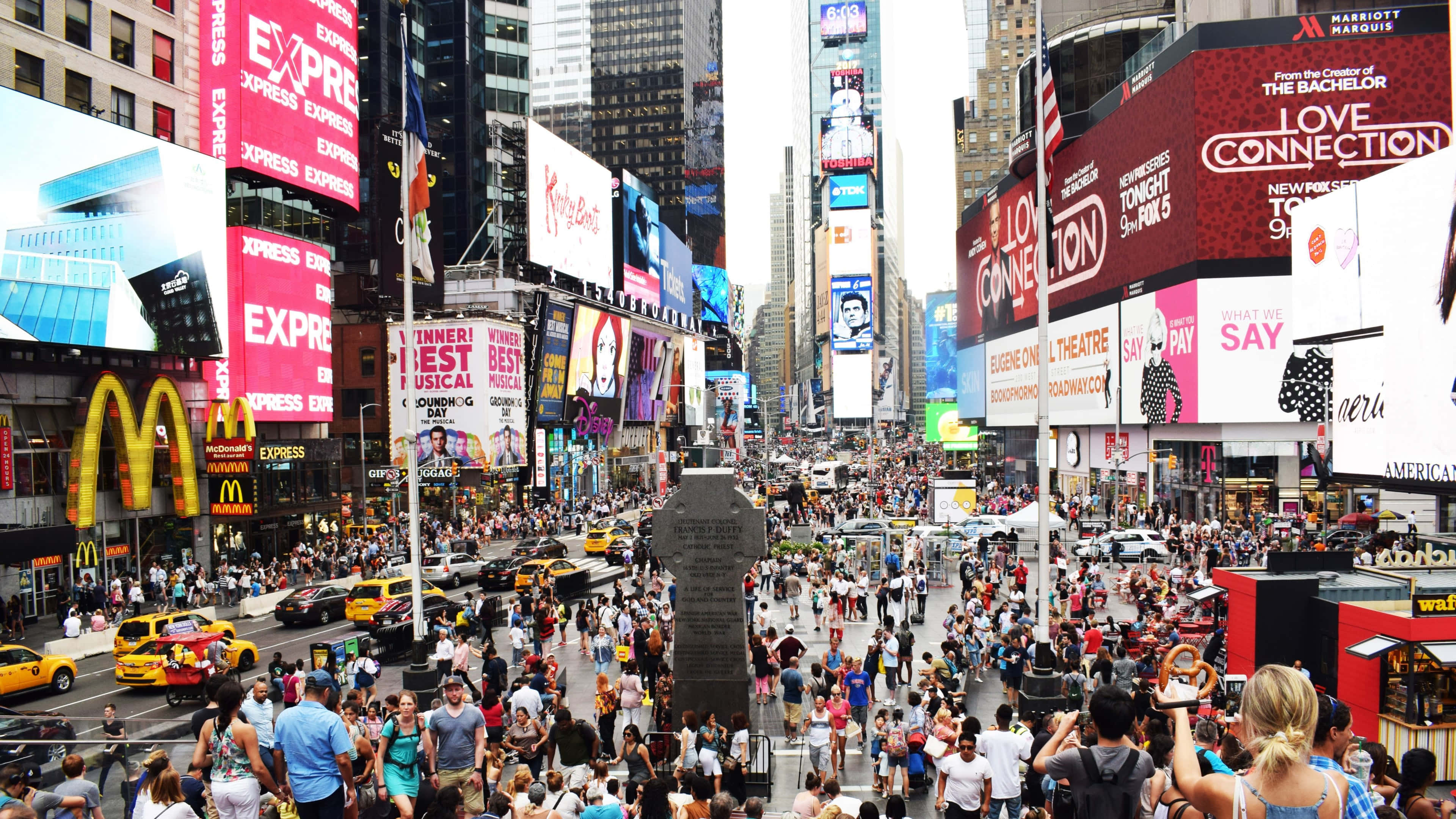Times Square, neon billboards, yellow taxis, 4K Desktop Wallpaper