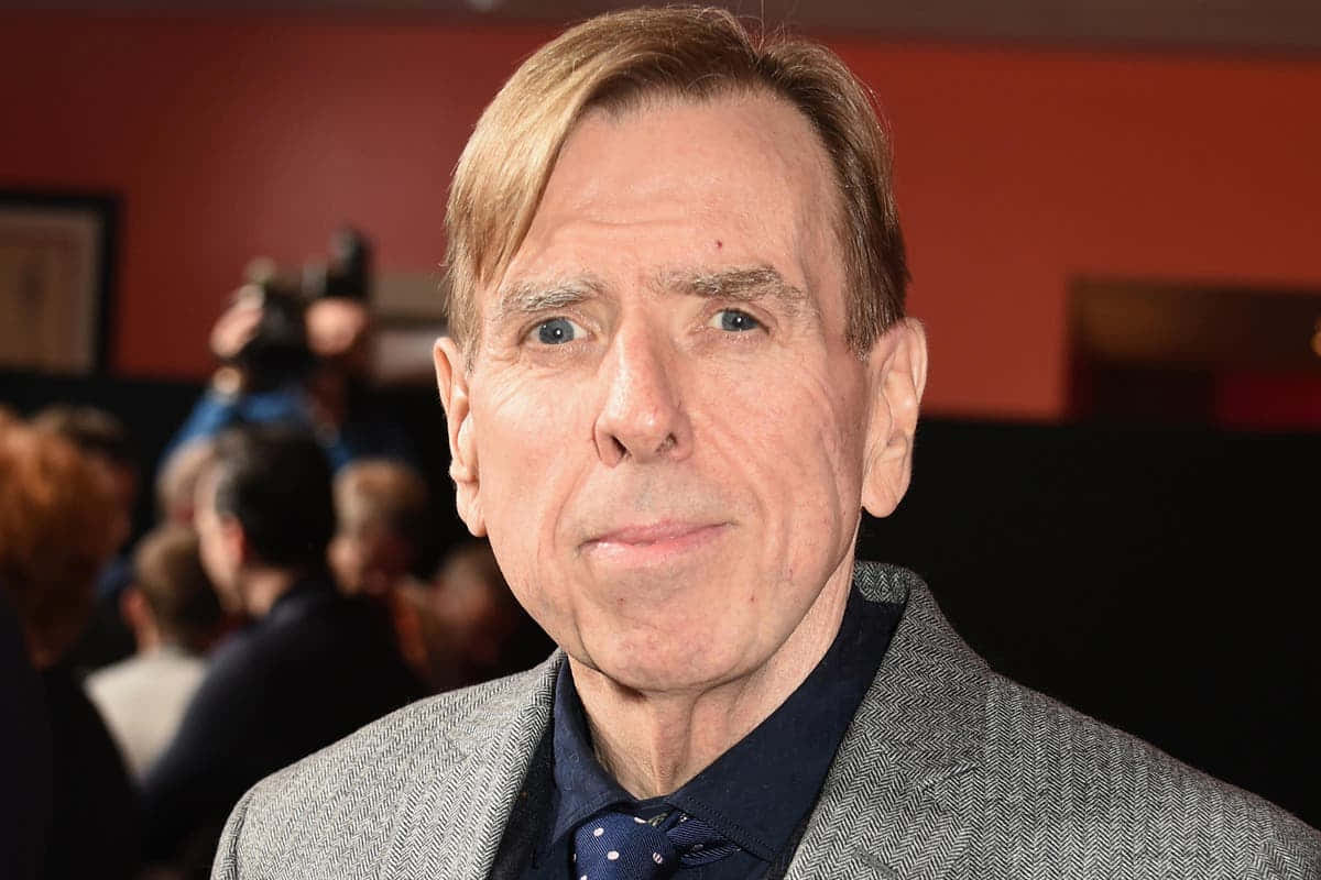 Timothy Spall, gray herringbone jacket, patterned tie, SD Desktop Wallpaper