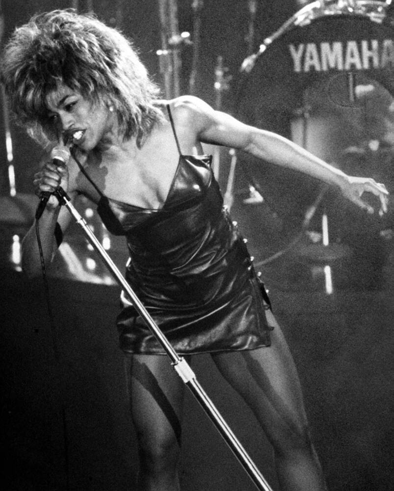 Tina Turner, leather dress, microphone, SD Phone Wallpaper