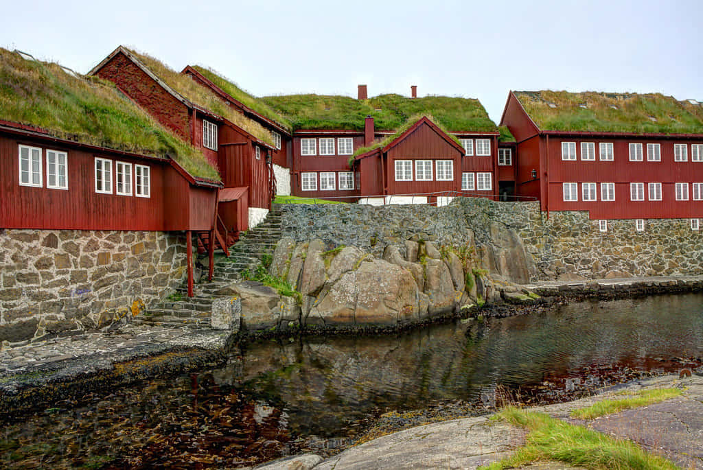 Tinganes, stone cliff, vibrant red wooden houses, SD Desktop Wallpaper