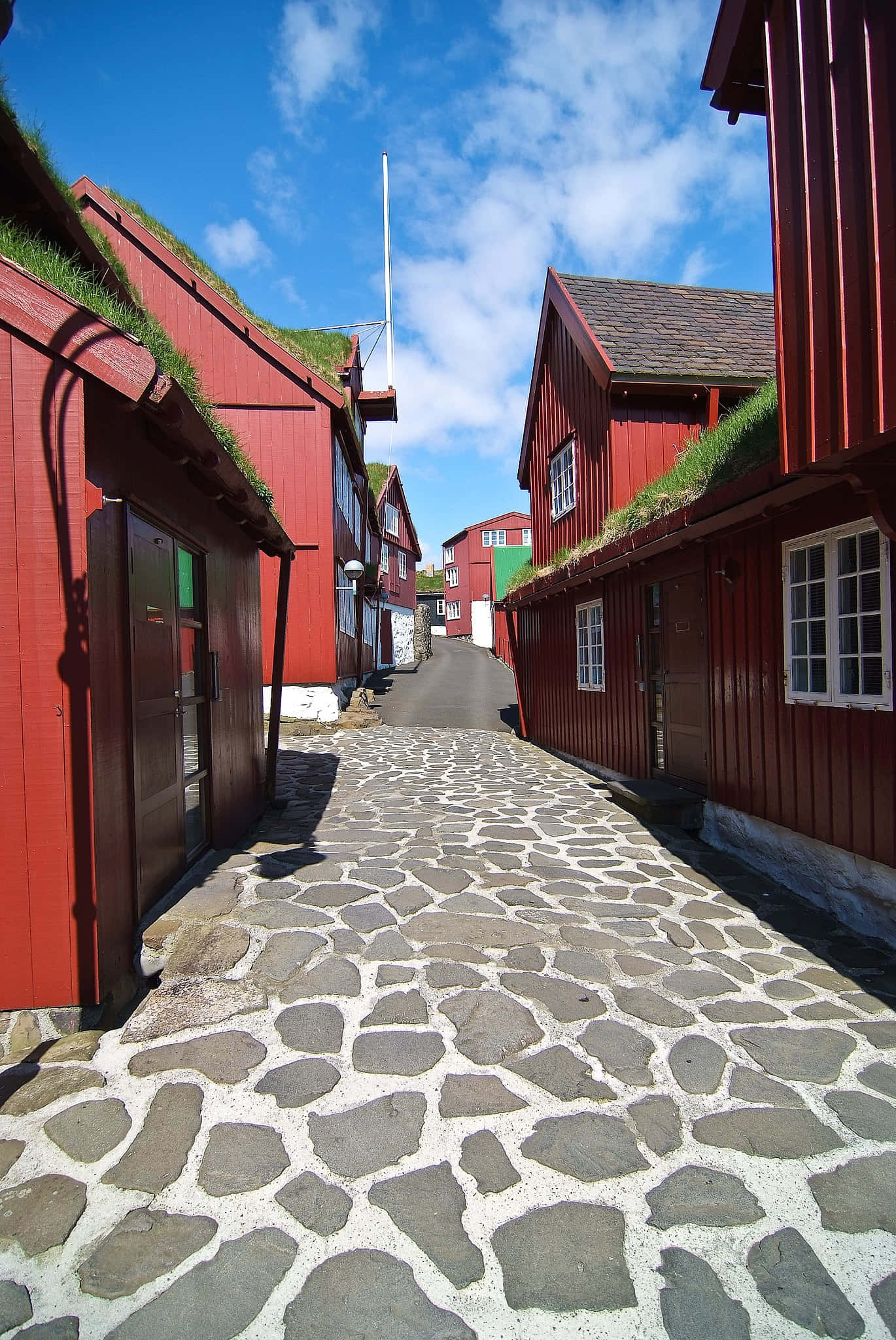 Tinganes, cobblestone streets, vibrant red wooden houses, Full HD Phone Wallpaper