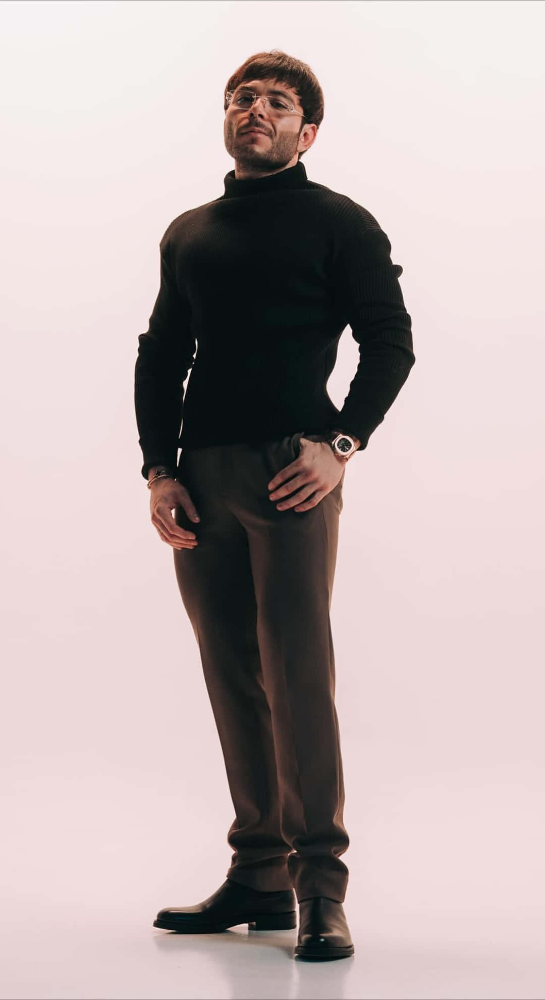 Tito Double P, black turtleneck, brown trousers, Full HD Phone Wallpaper