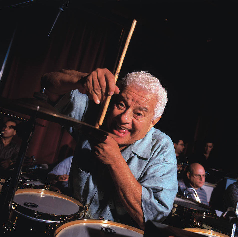 Tito Puente, wacky face, drumsticks, SD Desktop Wallpaper