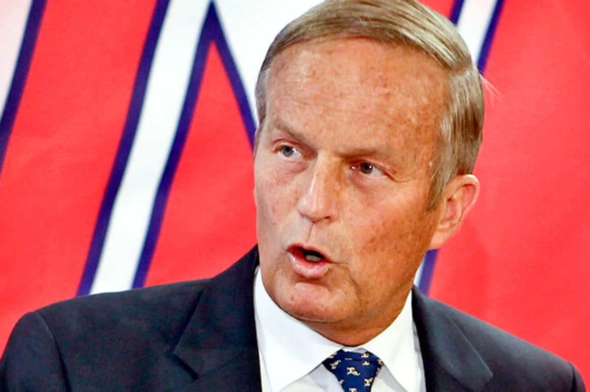 Todd Akin, red and white striped backdrop, suit, SD Desktop Wallpaper
