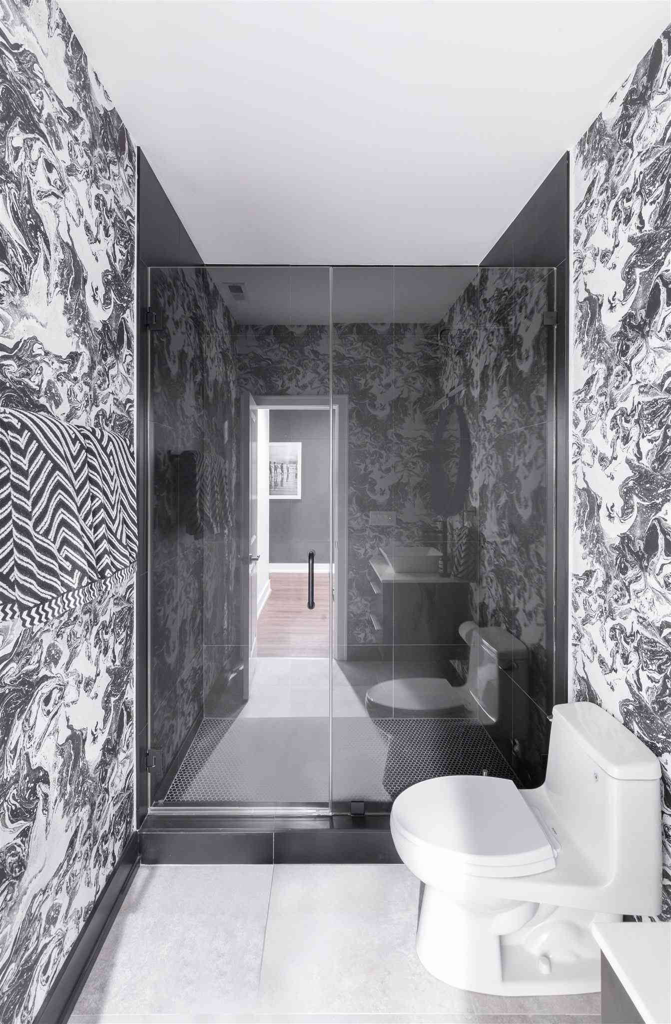 black and white patterned wallpaper, glass-enclosed shower, modern bathroom, Full HD Phone Wallpaper