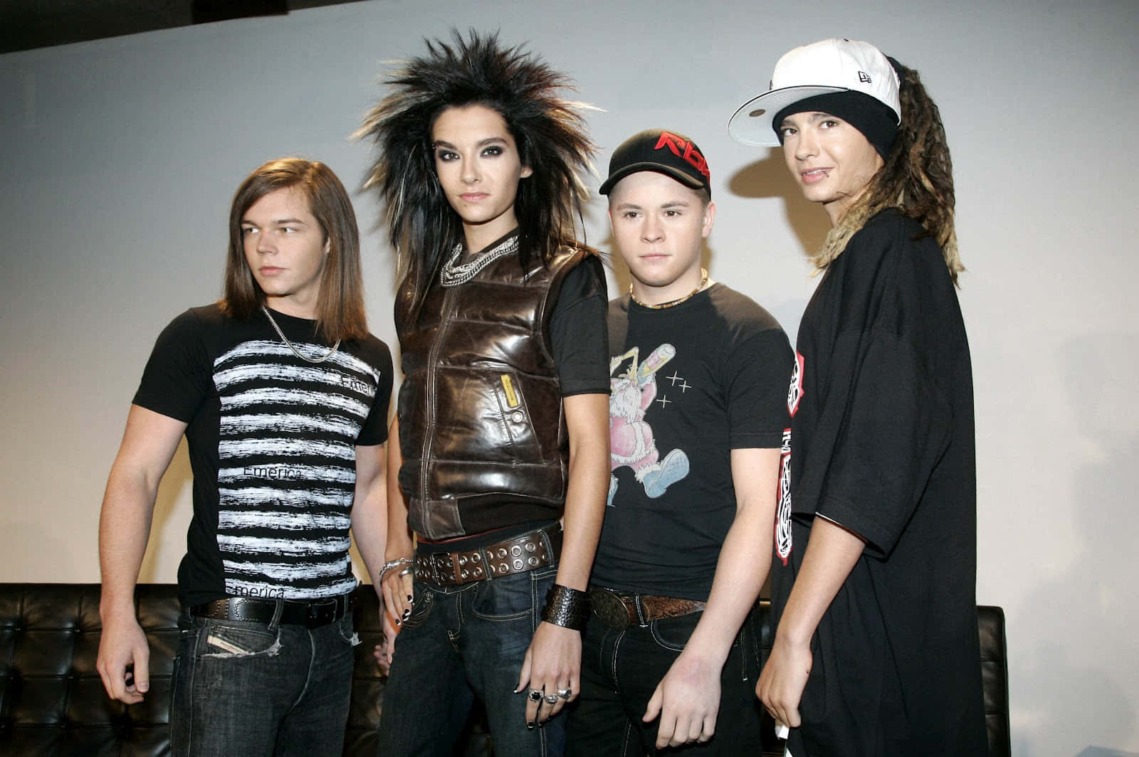 Tokio Hotel, punk rock attire, plain wall, HD Desktop Wallpaper