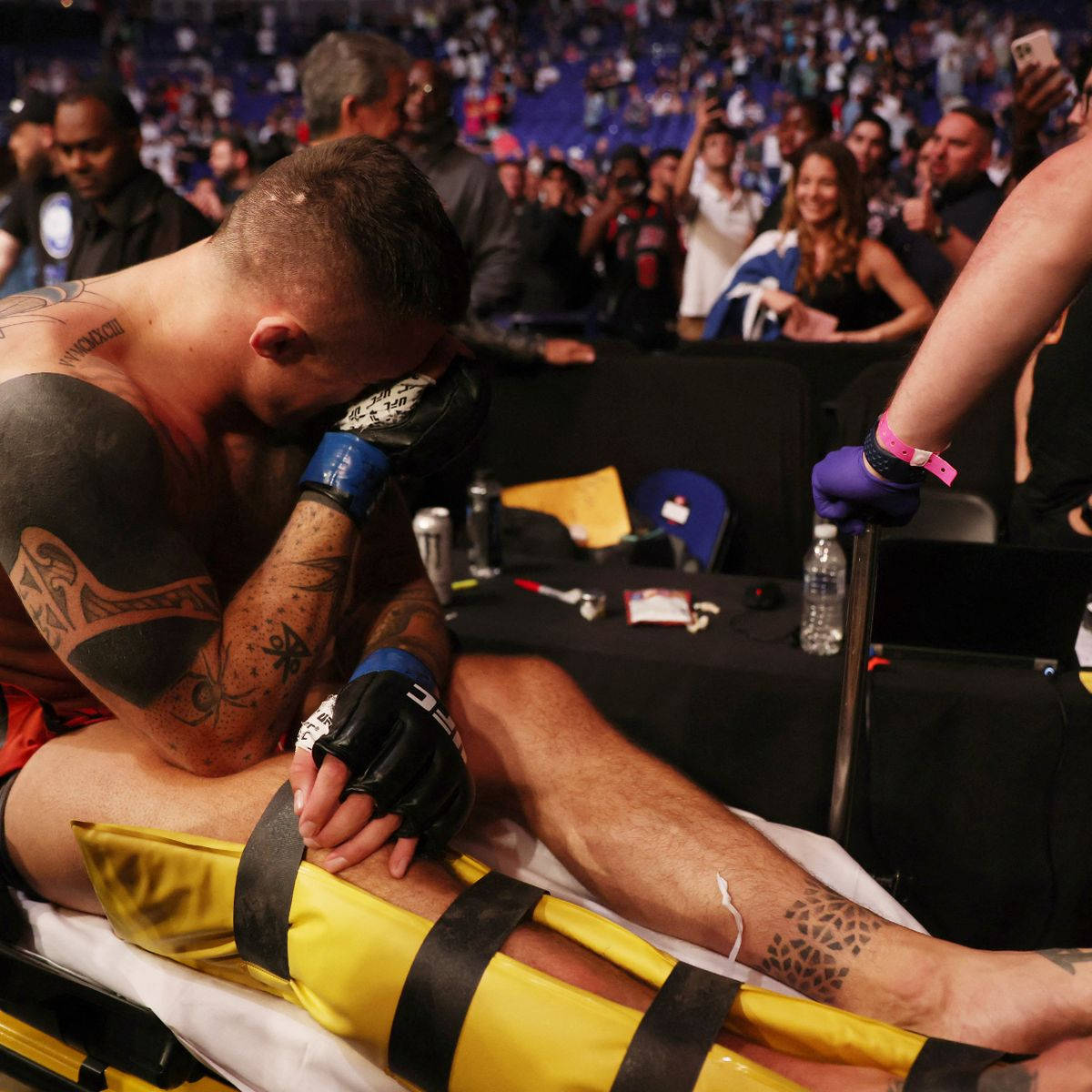 Tom Aspinall, black gloves, stretcher, SD Desktop Wallpaper