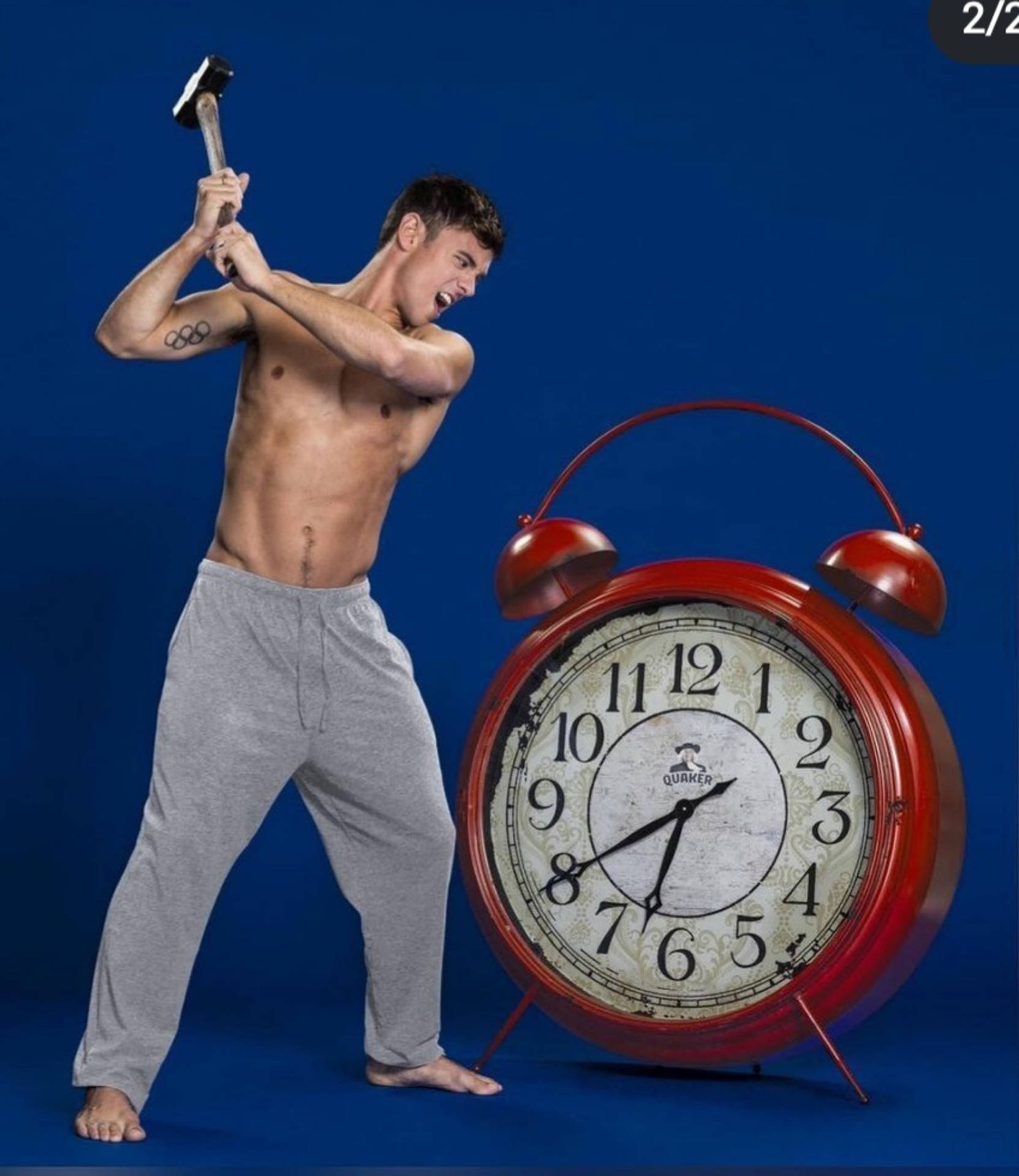 Tom Daley, red alarm clock, grey sweatpants, Full HD Phone Wallpaper