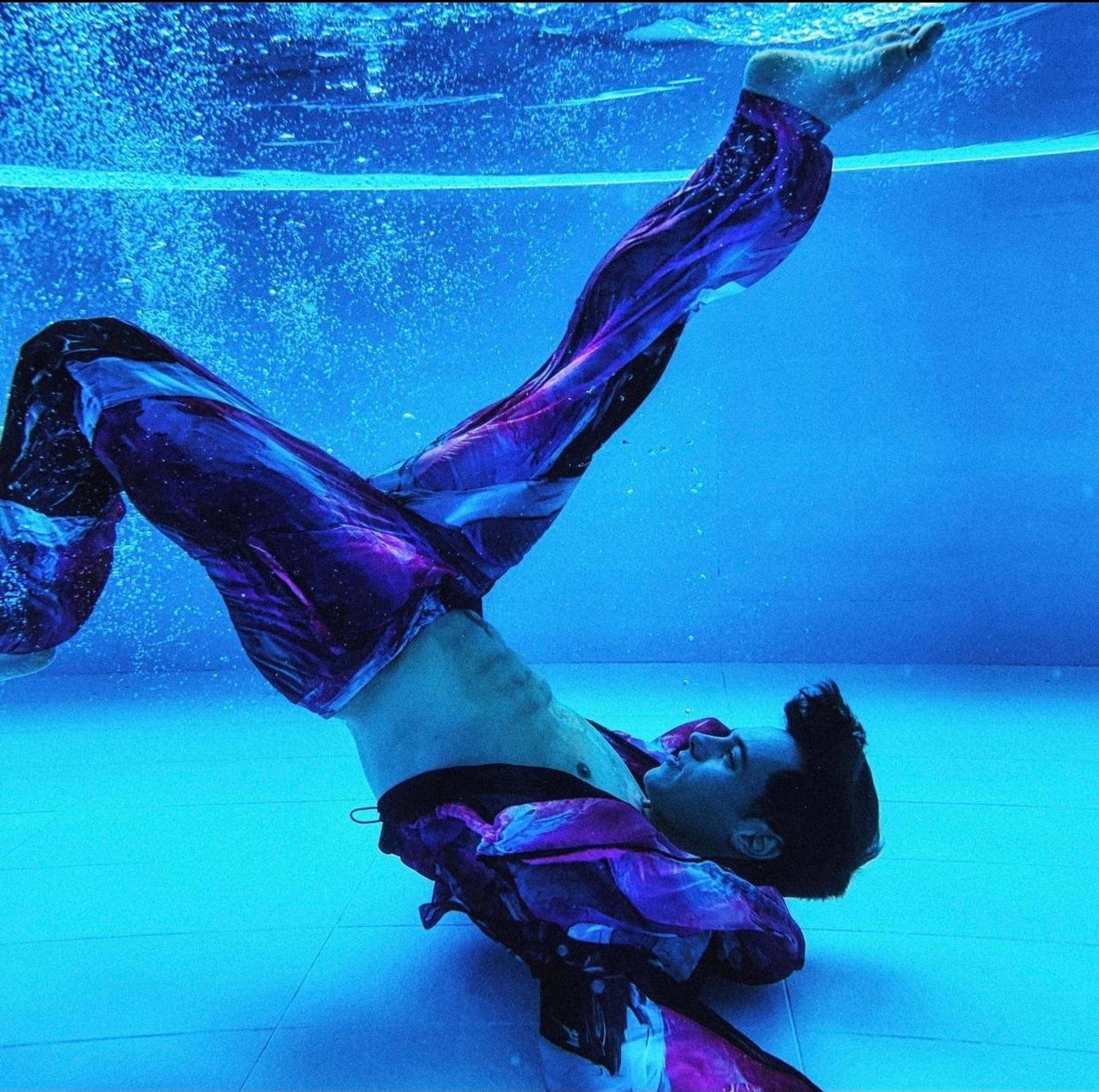 Tom Daley, blue pool, shimmering purple outfit, Full HD Desktop Wallpaper