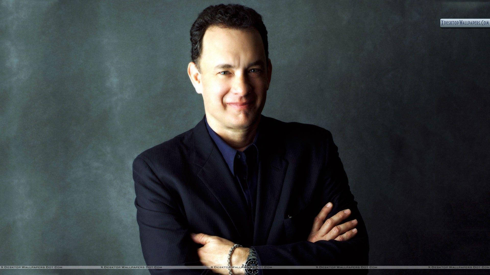Tom Hanks, arms crossed, dark textured studio backdrop, Full HD Desktop Wallpaper