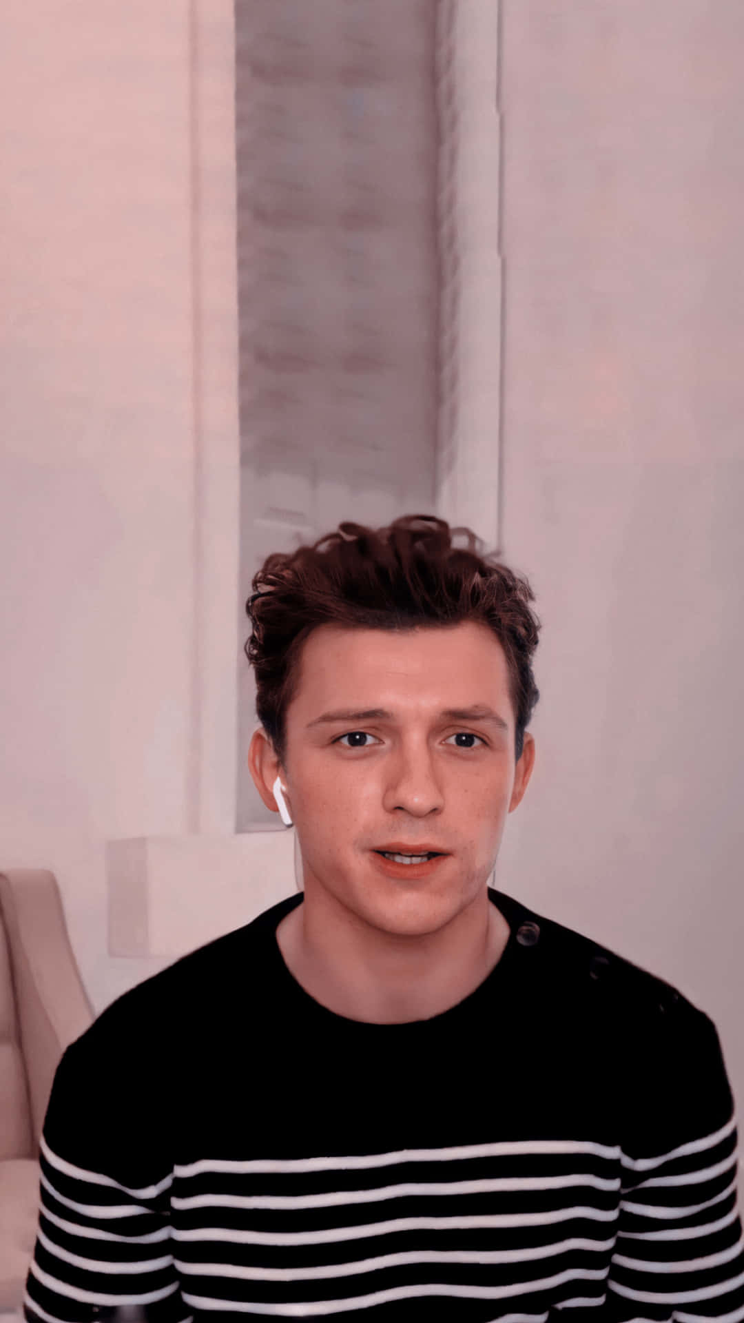 Tom Holland, black and white striped shirt, white earbuds, Full HD Phone Wallpaper