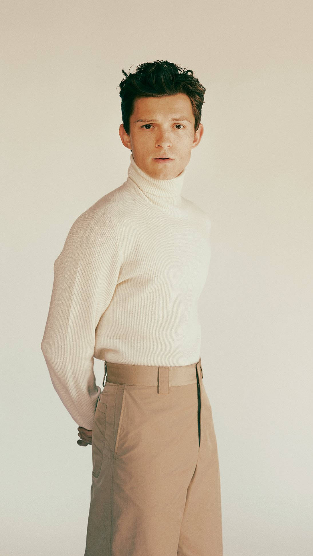 Tom Holland, cream turtleneck, beige trousers, Full HD Phone Wallpaper