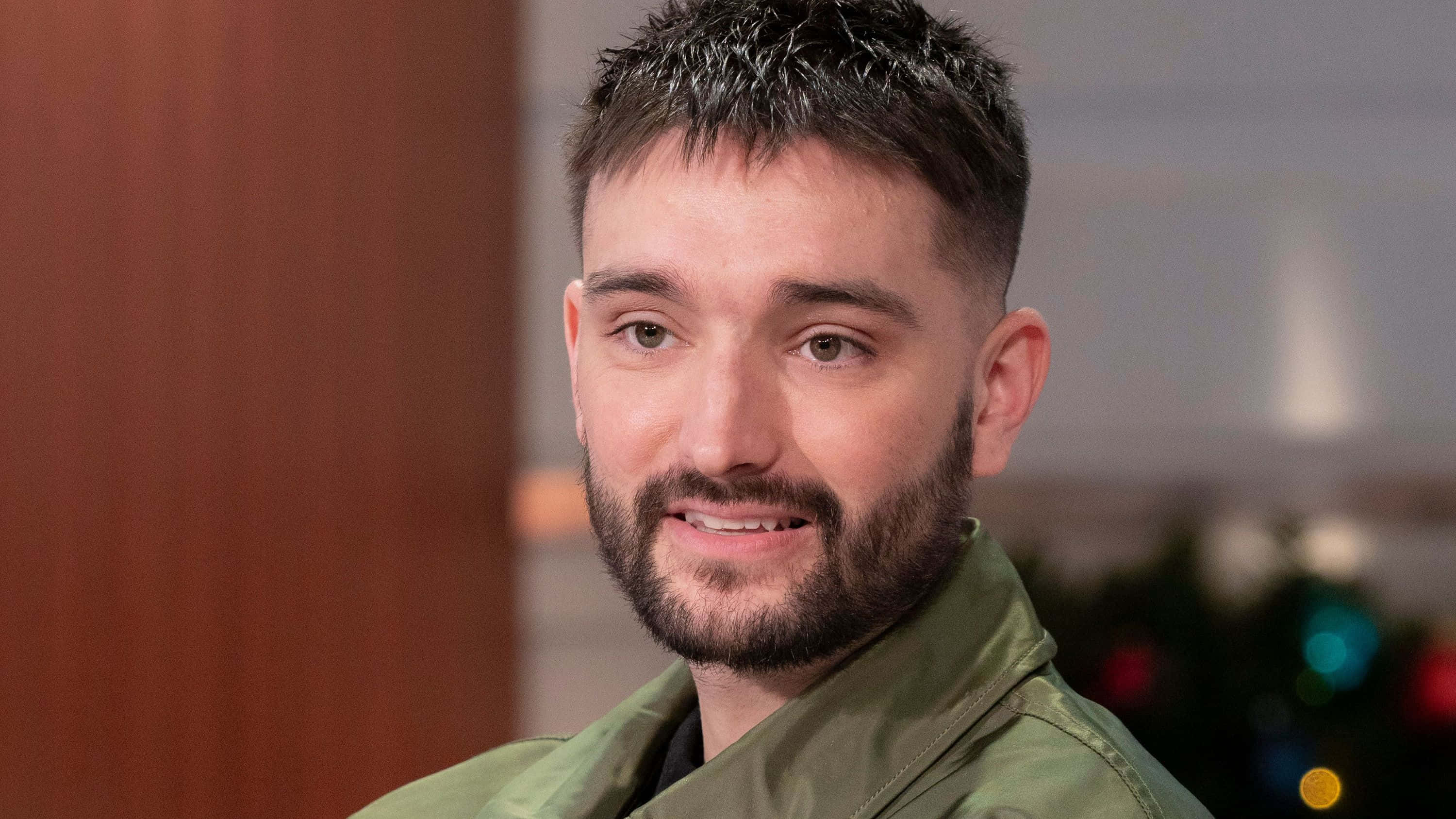 Tom Parker, green jacket, festive lights, 2K Desktop Wallpaper