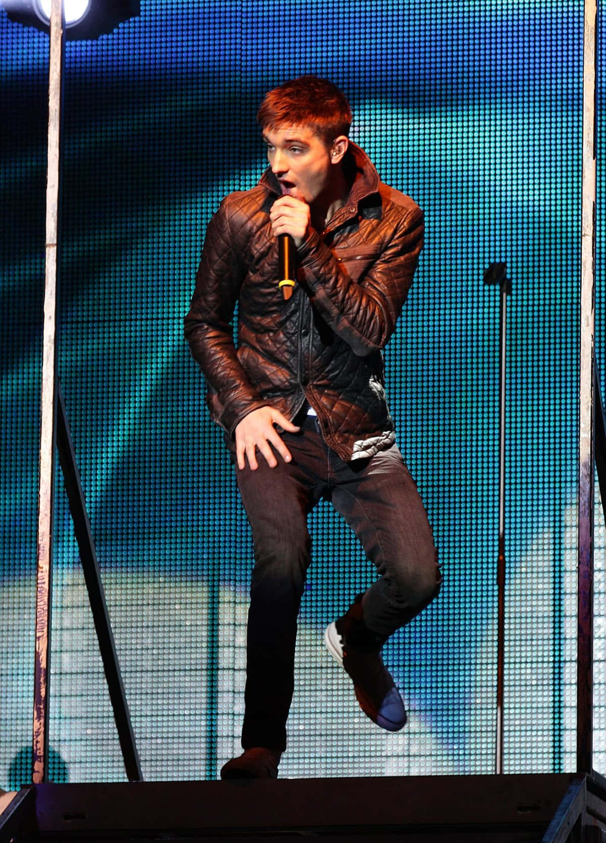 Tom Parker, microphone, glowing blue pixelated backdrop, HD Phone Wallpaper