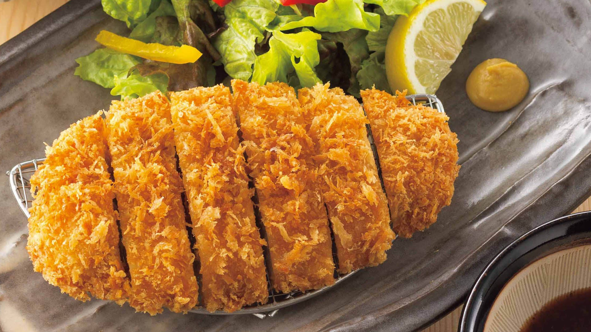 crunchy deep fried tonkatsu, golden-brown breaded cutlet, dark plate, Full HD Desktop Wallpaper
