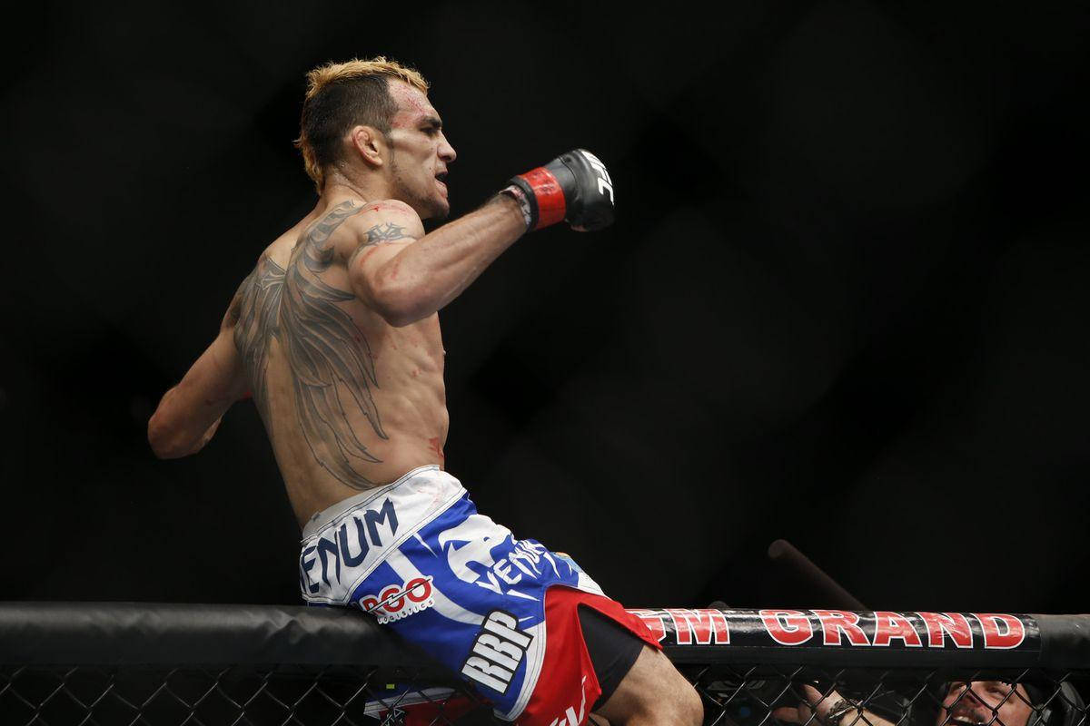 Tony Ferguson, blue red shorts, cage fence, SD Desktop Wallpaper