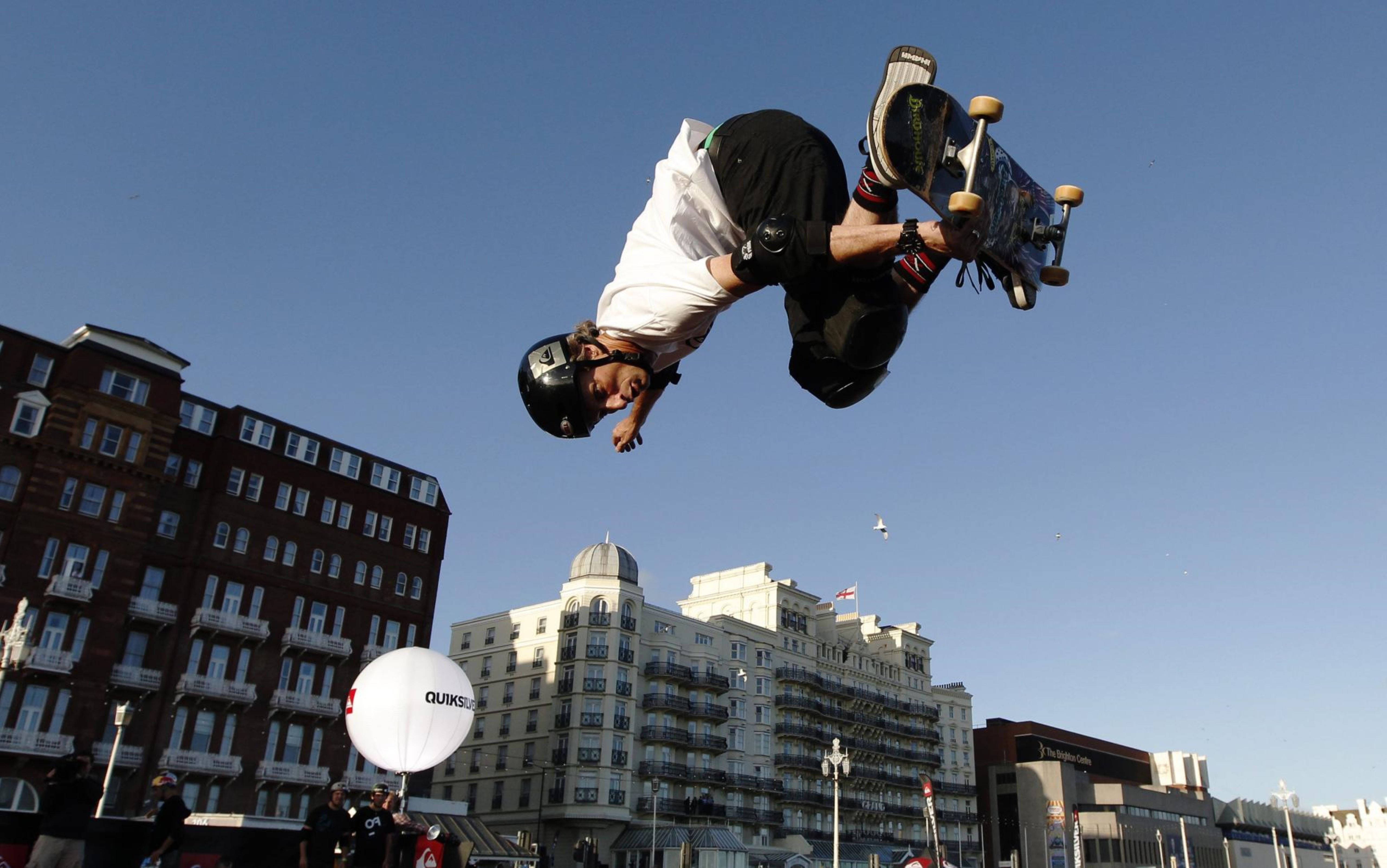 Tony Hawk, skateboard, urban buildings, 5K Desktop Wallpaper