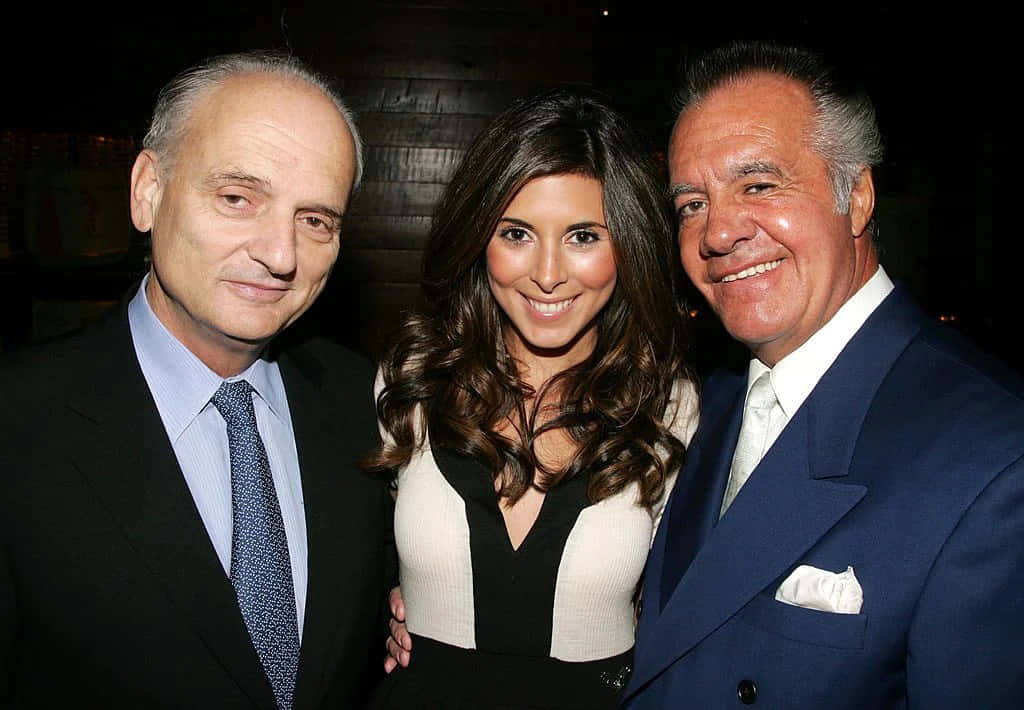 Tony Sirico, dimly lit indoor setting, warm ambient lighting, SD Desktop Wallpaper