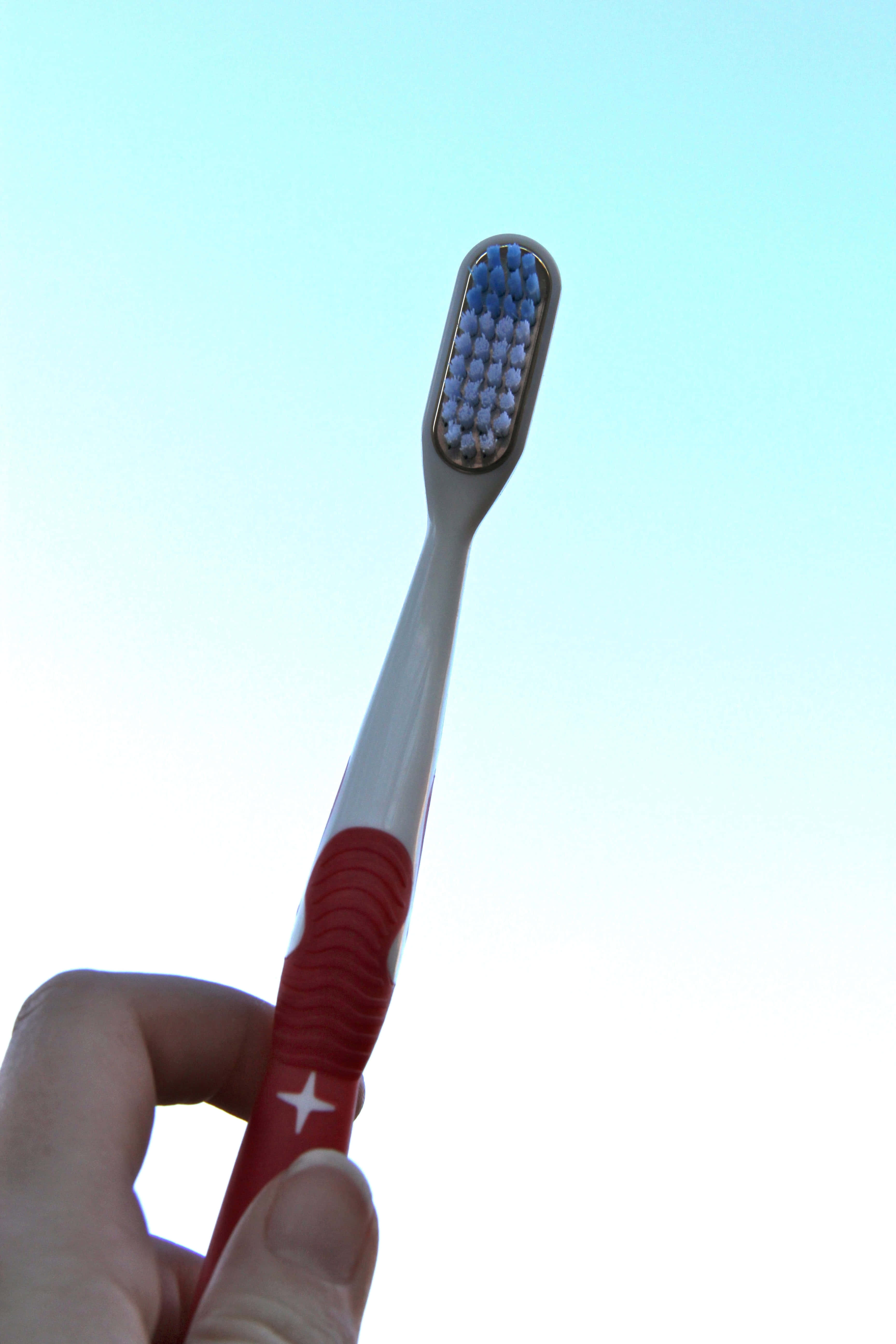 toothbrush, red and white, clear blue sky, 5K Phone Wallpaper