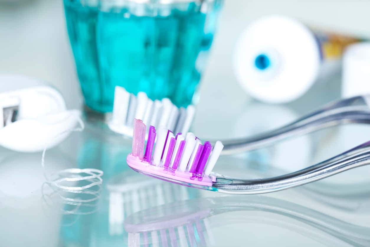 toothbrush, purple bristles, reflective glass surface, SD Desktop Wallpaper