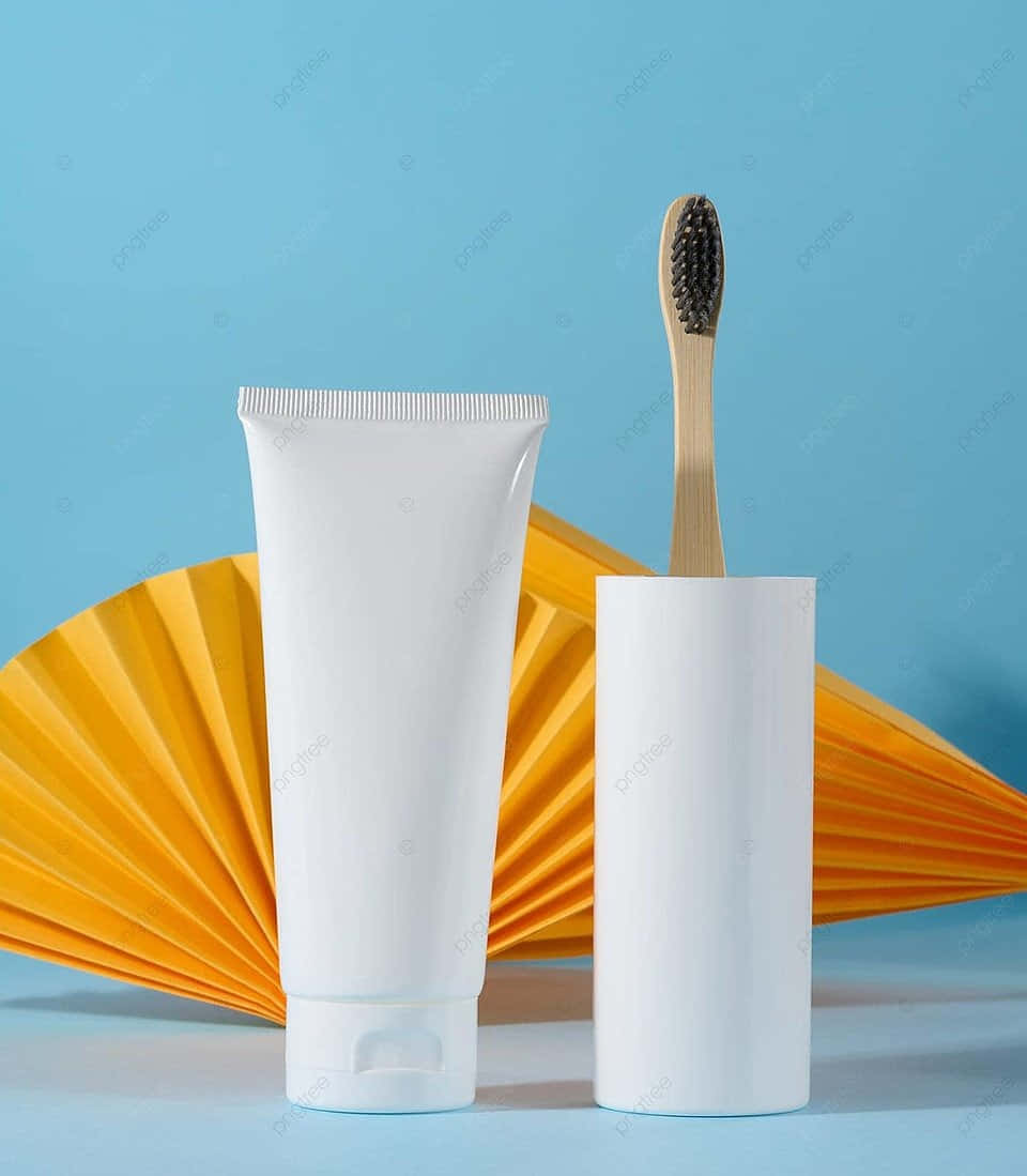 toothpaste tube, bamboo toothbrush, vibrant blue background, SD Phone Wallpaper