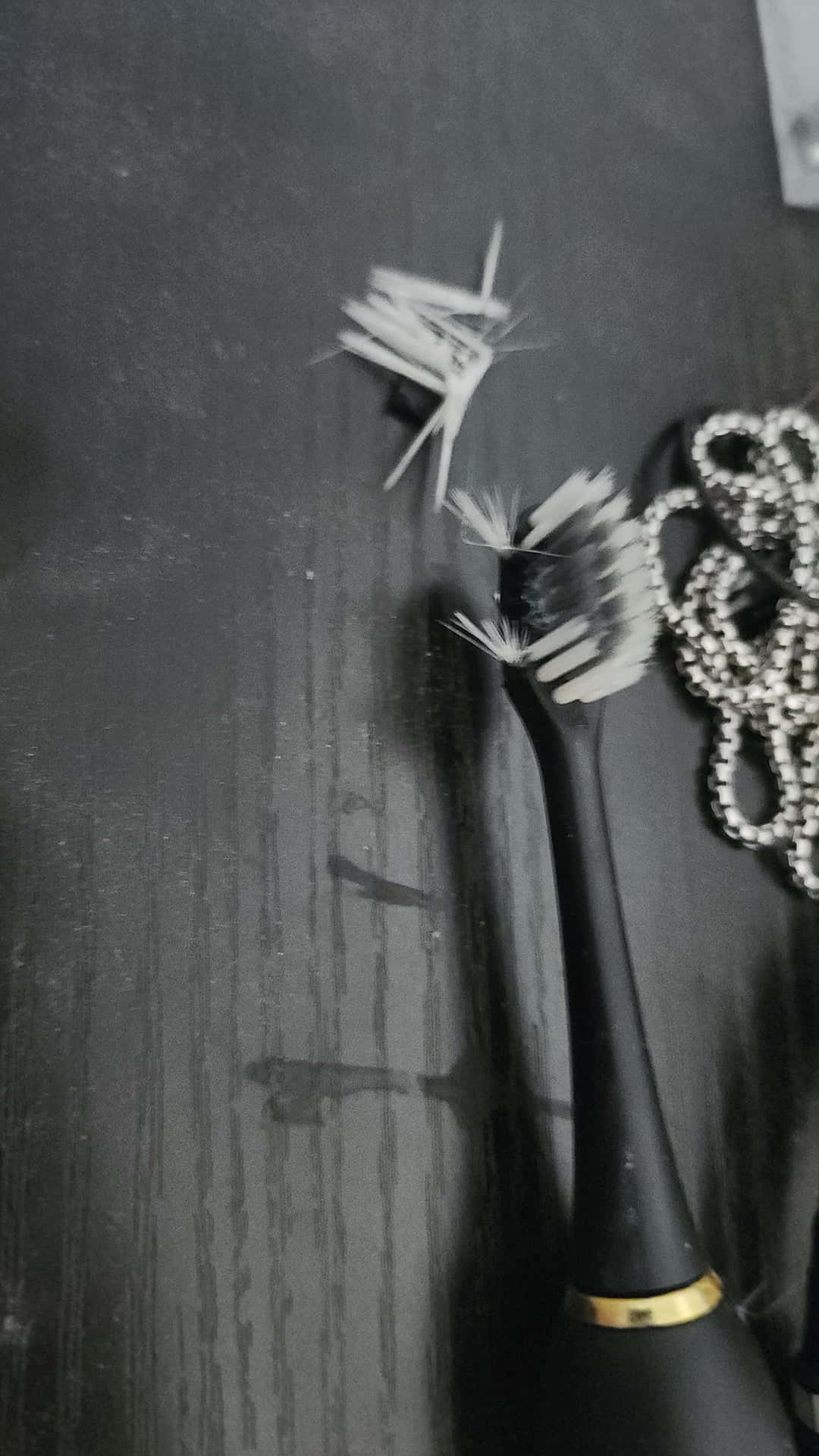 worn electric toothbrush, frayed bristles, dark textured surface, Full HD Phone Wallpaper