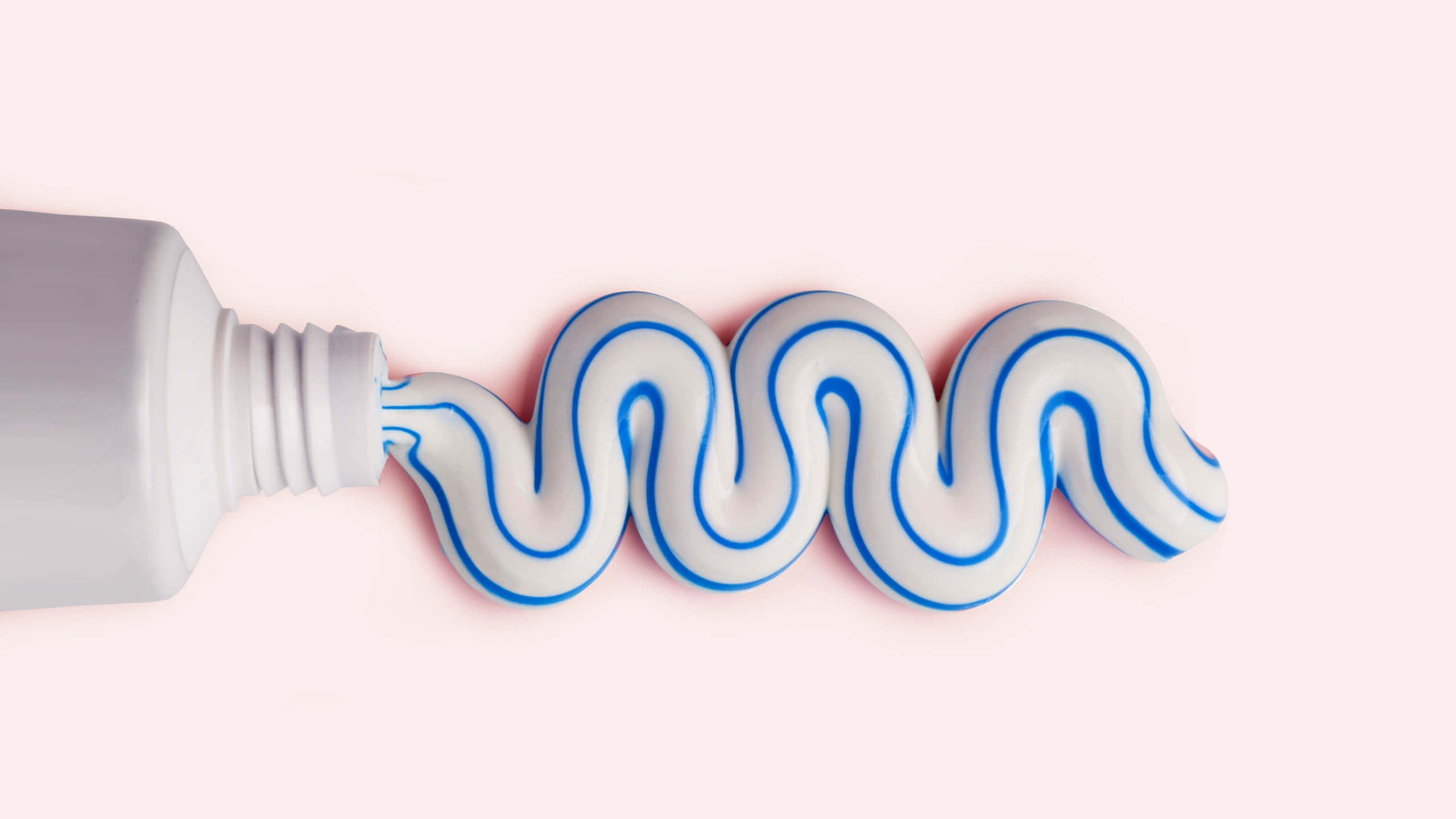 white toothpaste tube, wavy blue and white striped paste, soft pink background, 2K Desktop Wallpaper