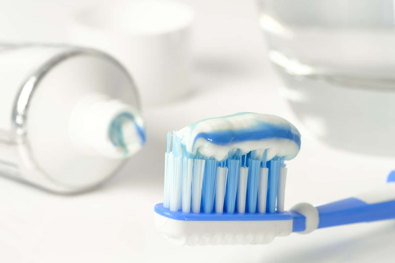 blue toothbrush, blue and white toothpaste, bright white bathroom background, HD Desktop Wallpaper