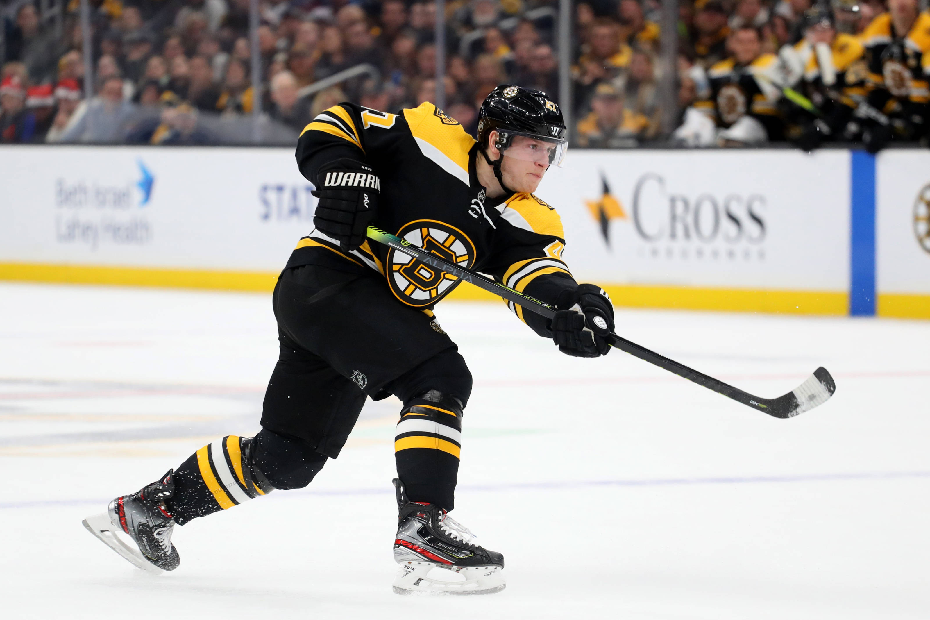 Torey Krug, black and gold uniform, ice, 2K Desktop Wallpaper