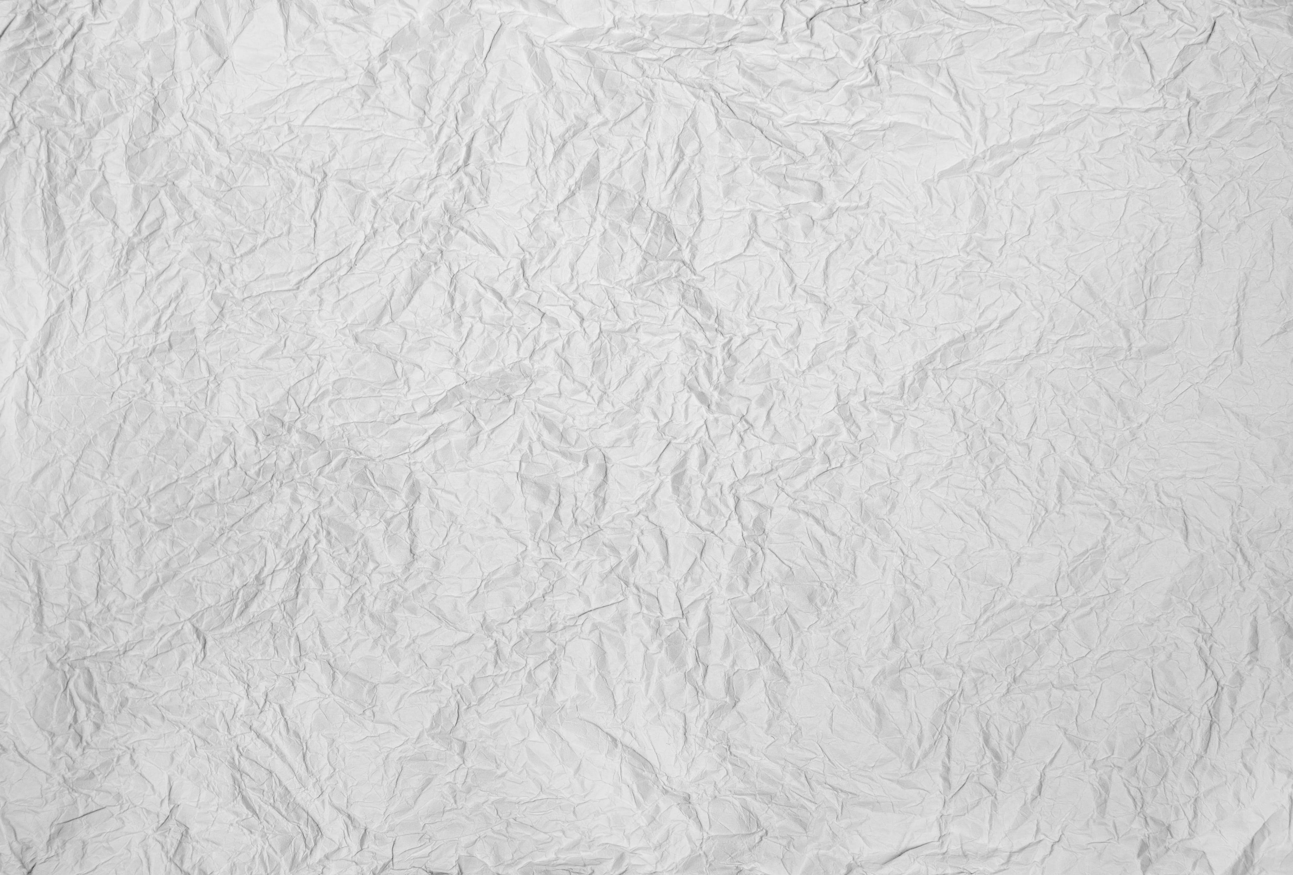 white crumpled paper, deep creases, soft shadows, 4K Desktop Wallpaper