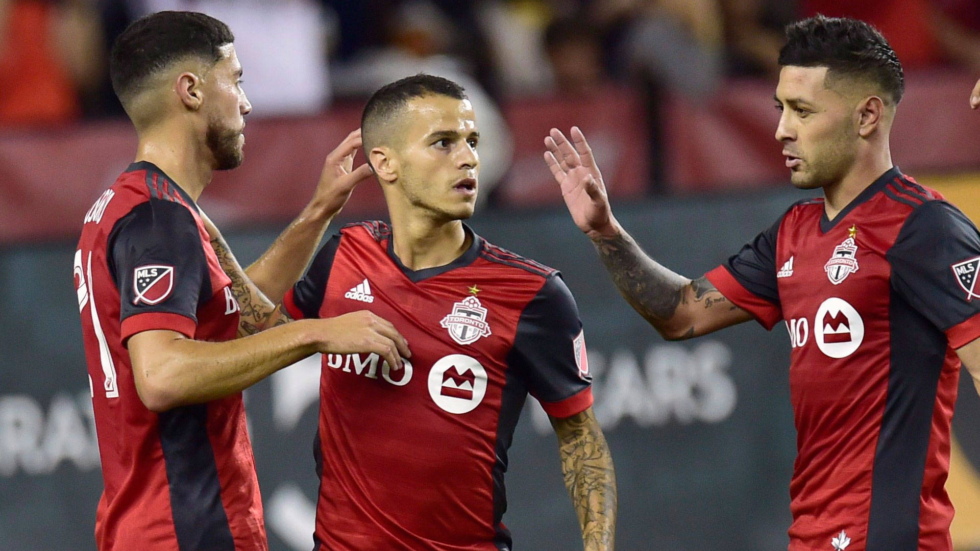Toronto FC, red and black jerseys, stadium field, Full HD Desktop Wallpaper